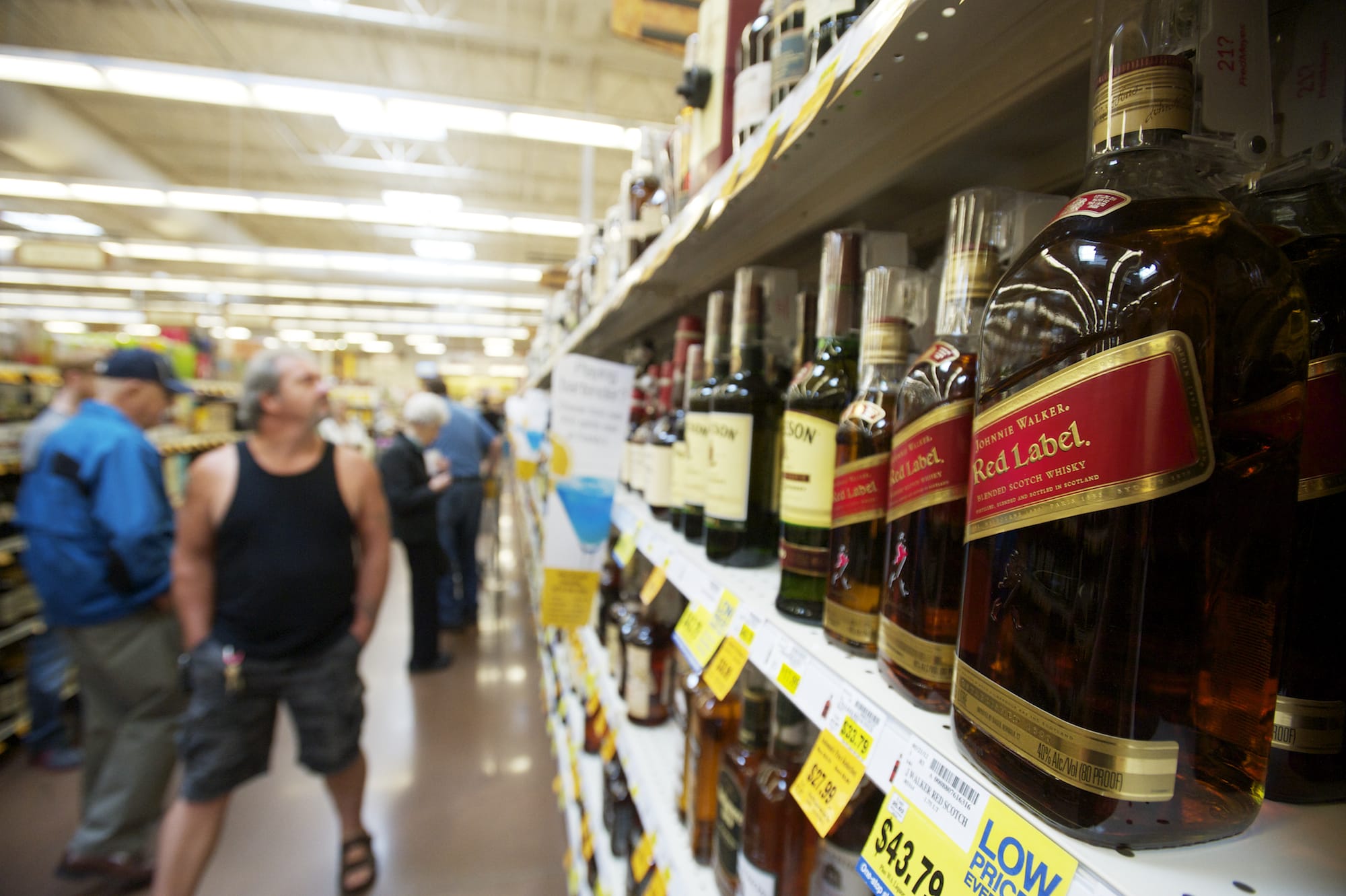 Booze prices at bars and restaurants in Washington may go up this year as multiple interests fight over rules following the voter-approved privatization of the state's liquor system.