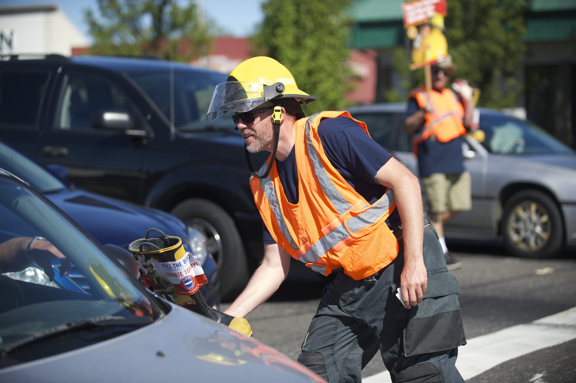 On Thursday, Vancouver firefighter Kevin Hart was among a group of off-duty fire service employees soliciting donations at Northeast Highway 99 and Northeast 78th Street.