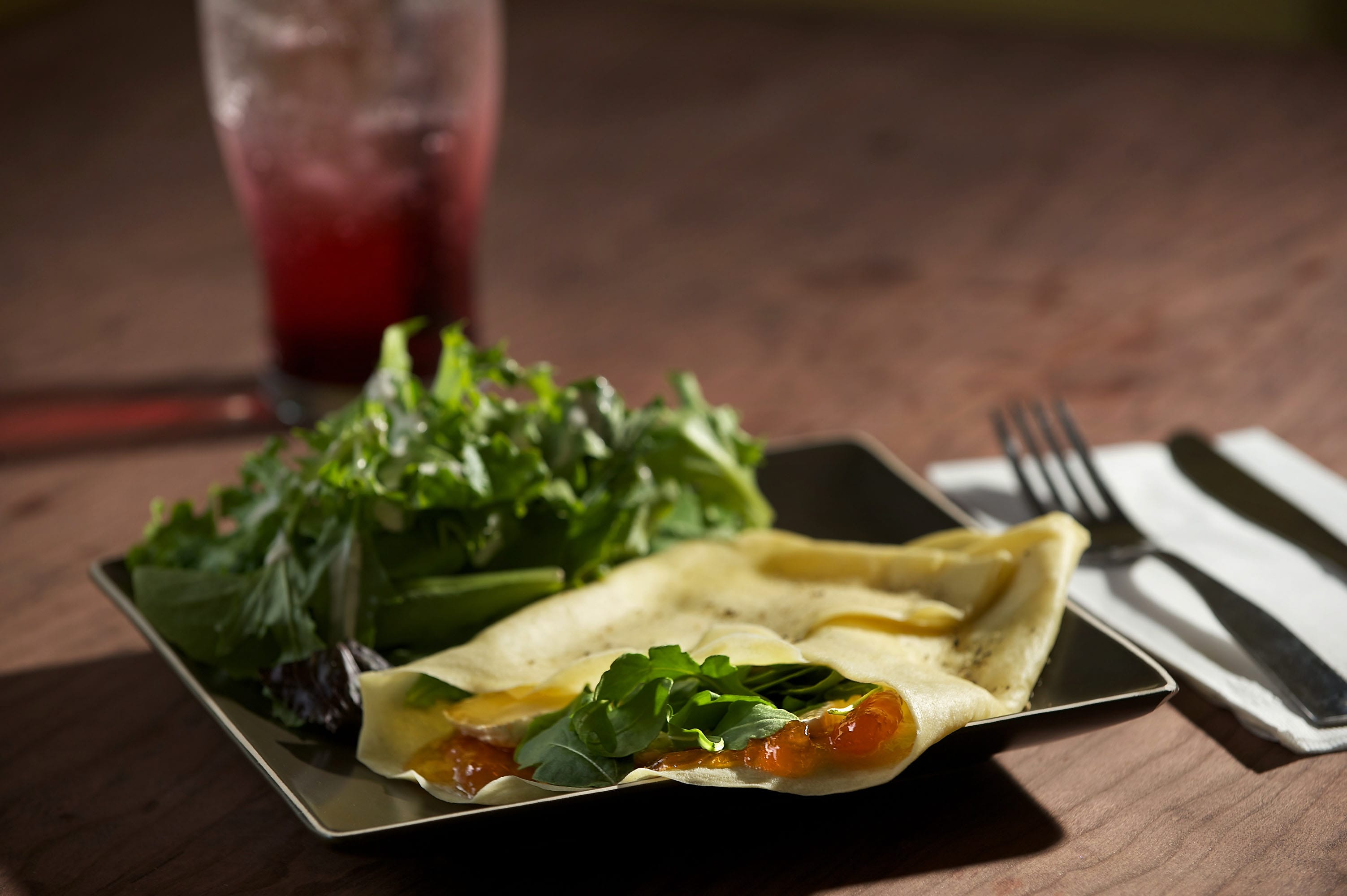 The Frenchie, a savory crepe, pairs with house-made blackcurrant soda at C'est La Vie in downtown Battle Ground.