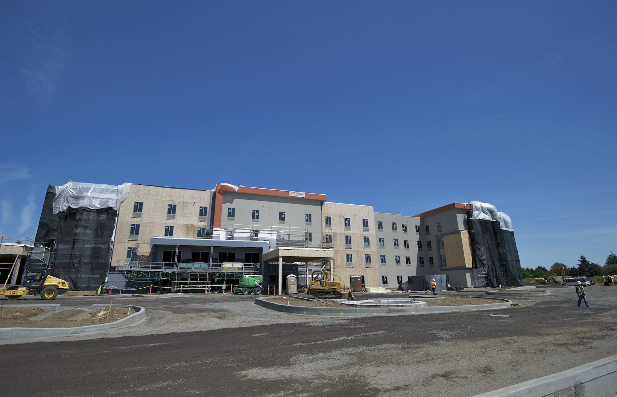 Zachary Kaufman/The ColumbianWork is continuing on a Hampton Inn &amp; Suites under construction at the former Evergreen Airport at Southeast Mill Plain Boulevard and 136th Avenue.