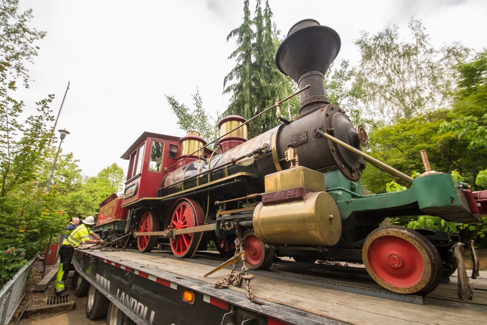 The Oregon Zoo's Centennial steam locomotive arrives Monday at Pacific Power Group headquarters in Ridgefield.
