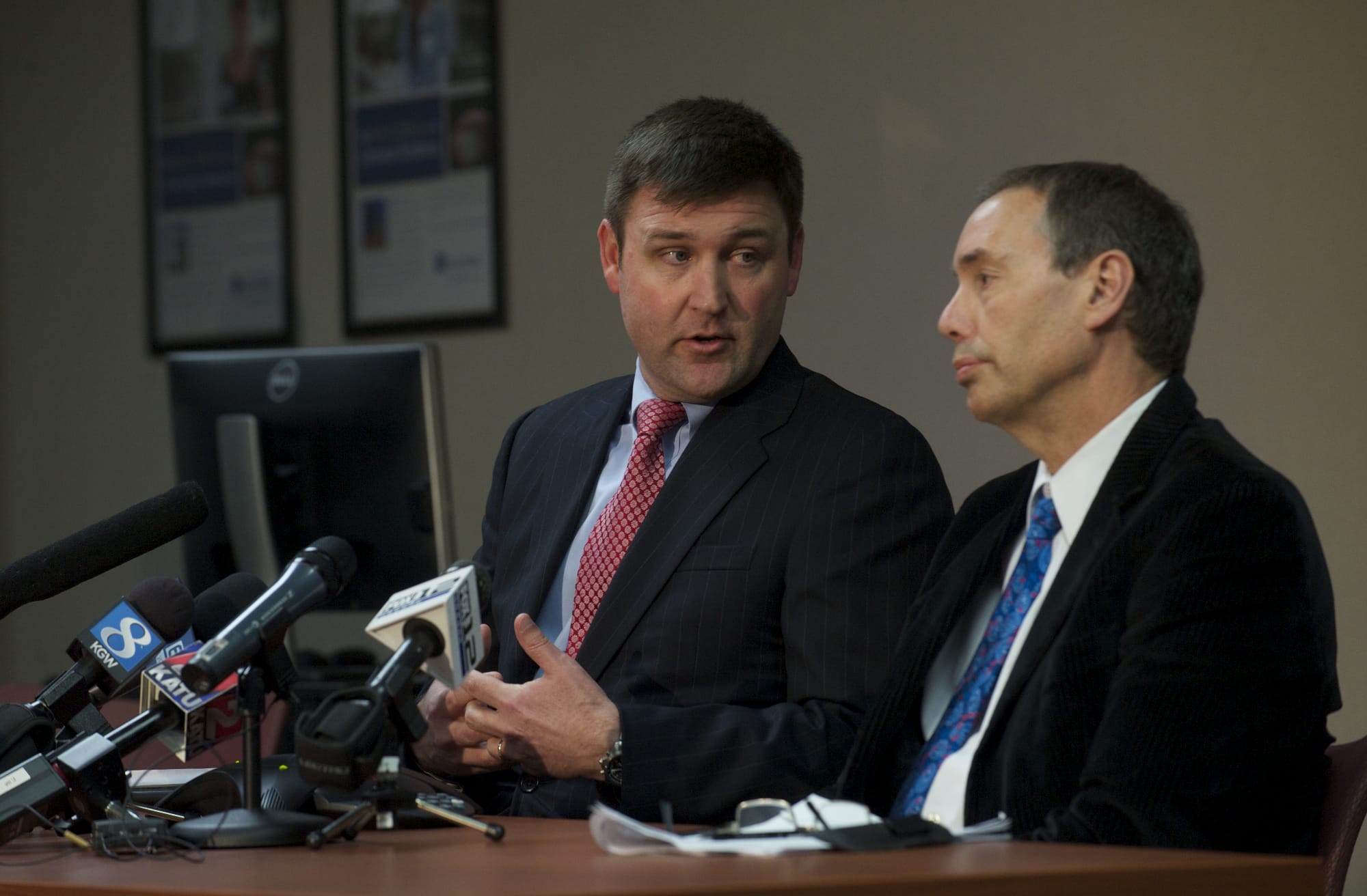 PeaceHealth Columbia Network CEO Sy Johnson, left, and Dr. Alan Melnick, Clark County Public Health director, discuss on Monday an investigation into whether a former employee exposed patients to hepatitis C.