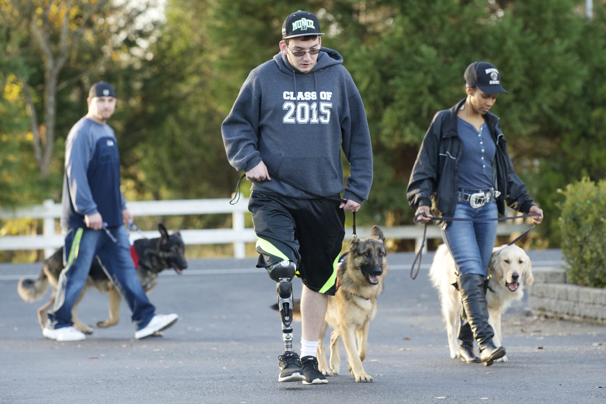 Justin Carey trains his service dog Shiva with veterans who are receiving dogs through Northwest Battle Buddies.