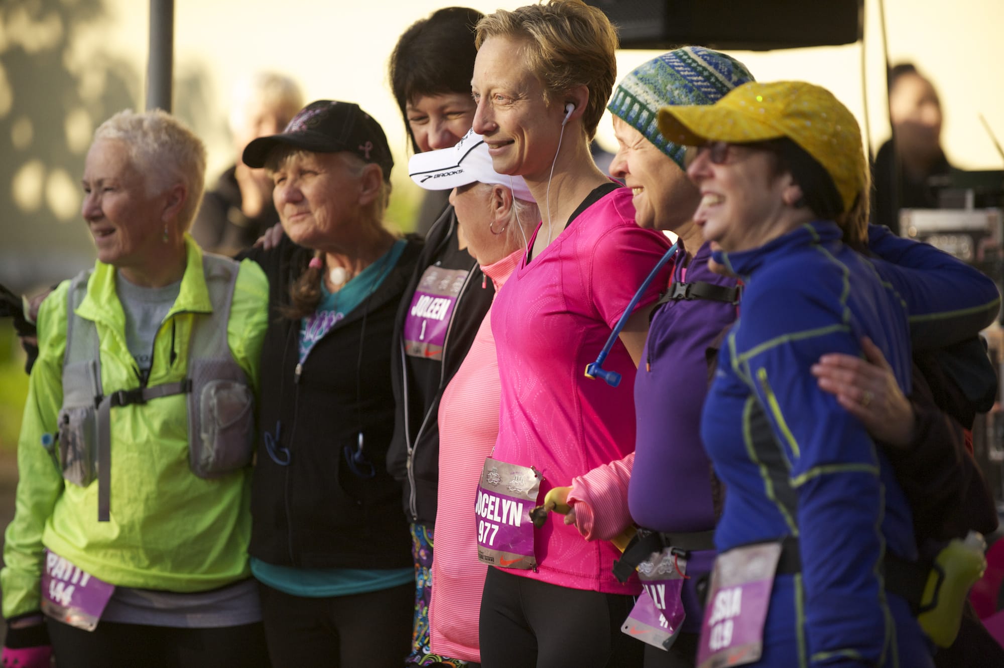 Cancer survivors pose for a photo before the start of the 7th annual Girlfriends Half Marathon in October.