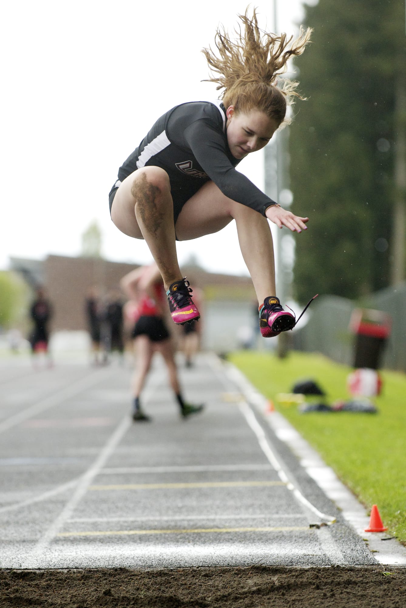Union's Tayler Troupe competes in the long jump at Camas High School, Tuesday, April 22, 2014.