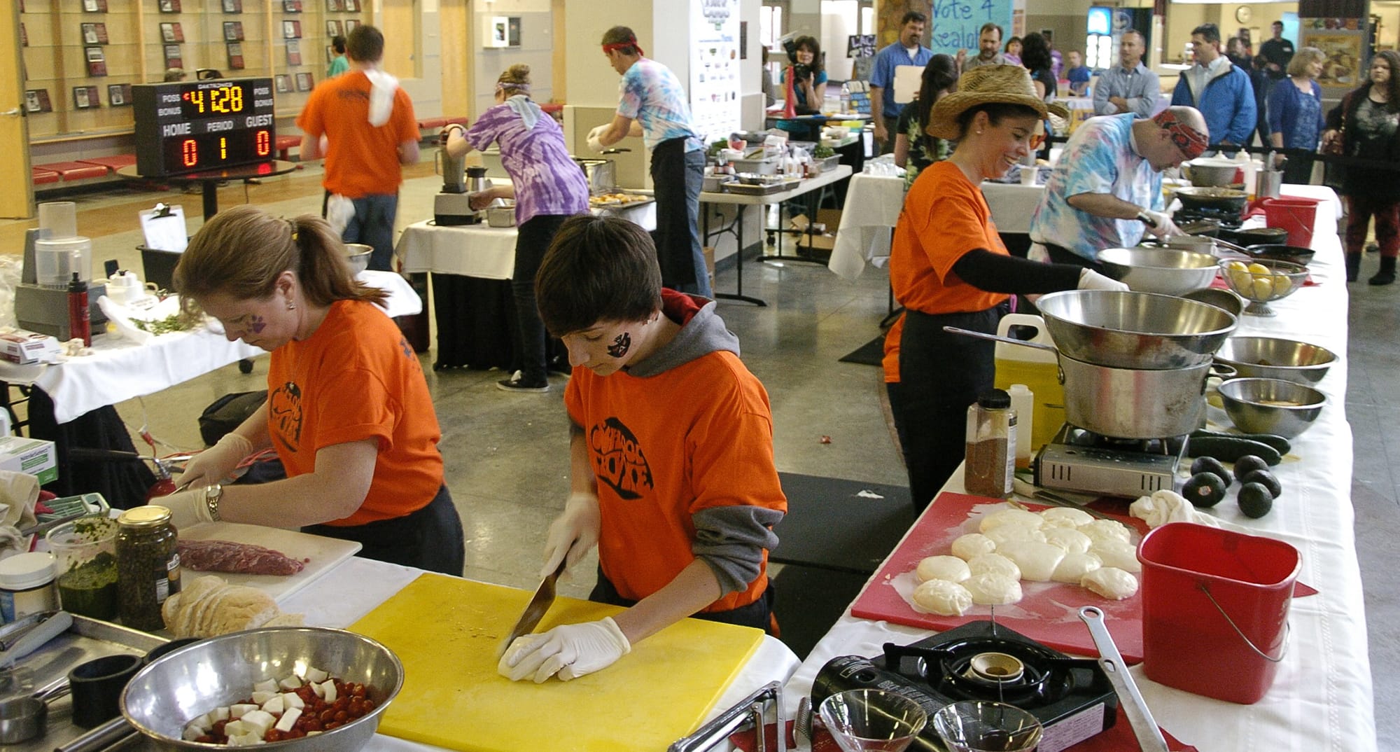 With the &quot;Iron Chef&quot; inspired cooking contest reaching its half-way mark on Sunday, teams &quot;School Thyme&quot; and &quot;Don't Mesa With the Best&quot; fight to make the most appetizing and creative dishes during the Taste of Camas event at Camas High School.