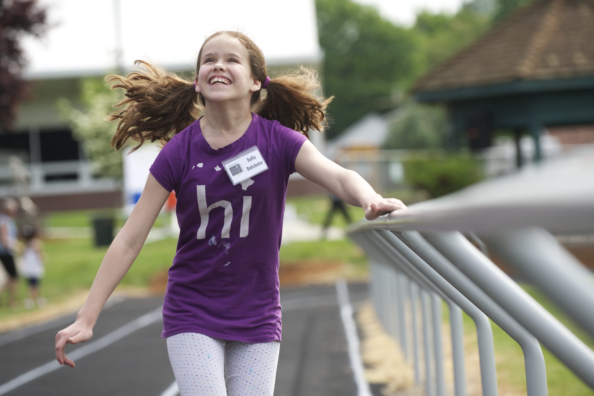 Sofia Batchelor, 10, of Vancouver runs the 100 meters at the Washington State School for the Blind track meet. &quot;Sometimes I feel like I'm flying.