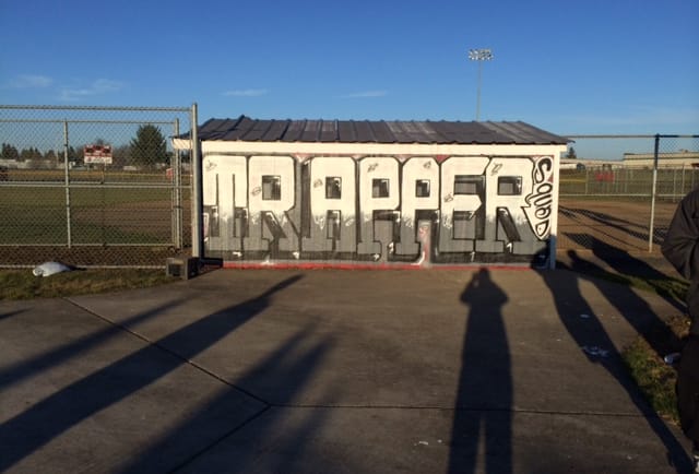 Fort Vancouver High School students finished a &quot;Trapper&quot; mural Sunday on the dugout at the softball field.