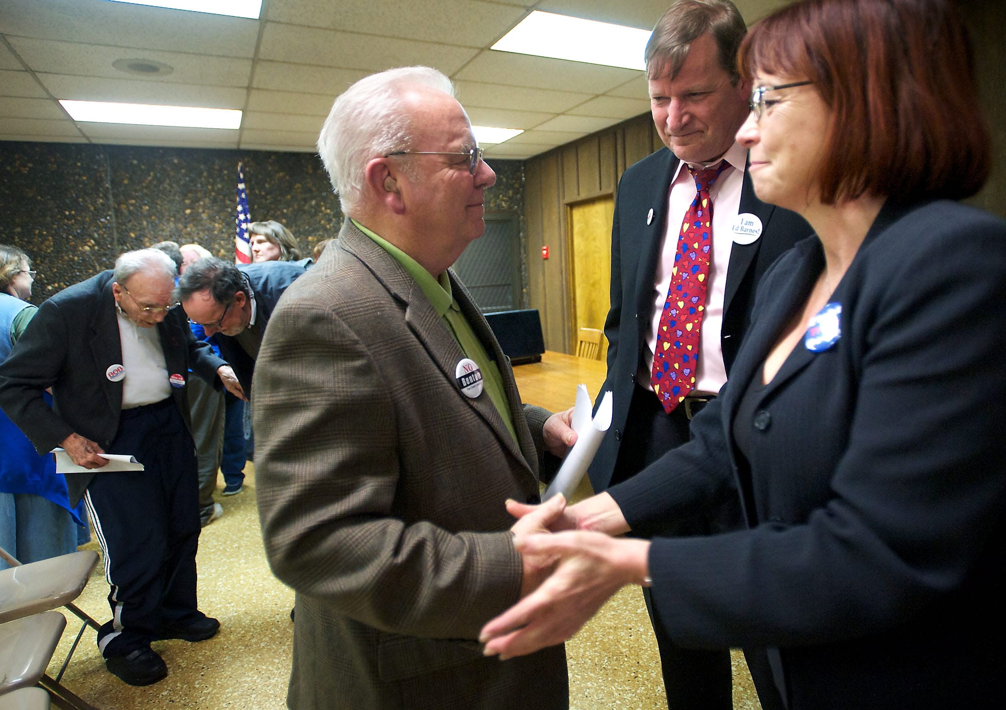 Ed Barnes, from left, Craig Pridemore and Kelly Love Parker congratulate each other after the Clark County Democrats selected and ranked them in March as their top three candidates in the order of Pridemore, Parker and Barnes, to fill the commissioner seat vacated by Steve Stuart.