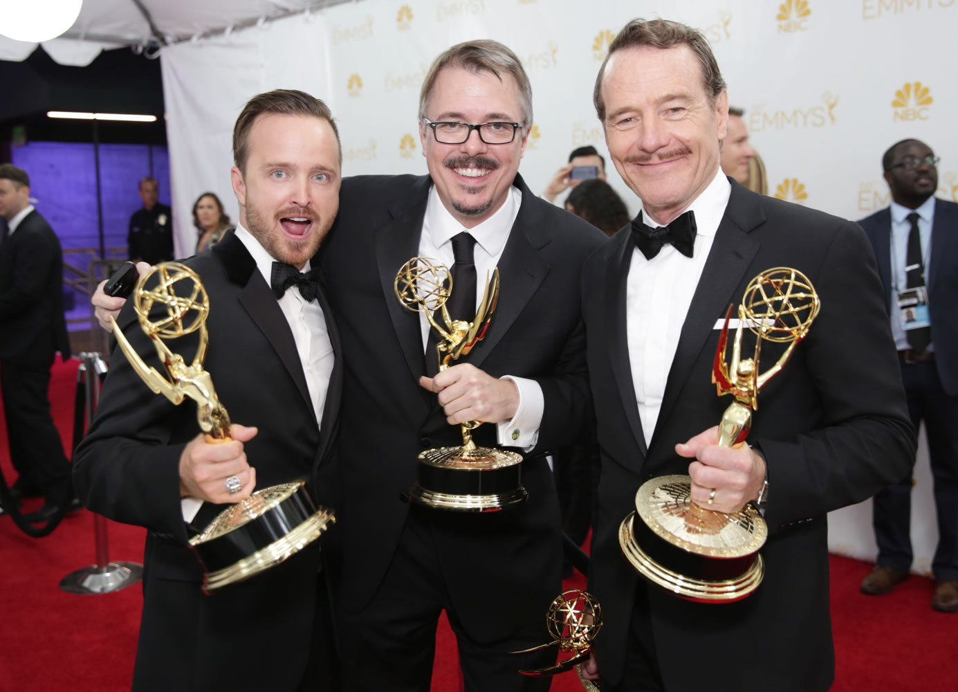 Casey Curry/Invision for the Television Academy
Aaron Paul, left, Vince Gilligan and Bryan Cranston pose Monday at the 66th Primetime Emmy Awards at the Nokia Theatre L.A. Live in Los Angeles.