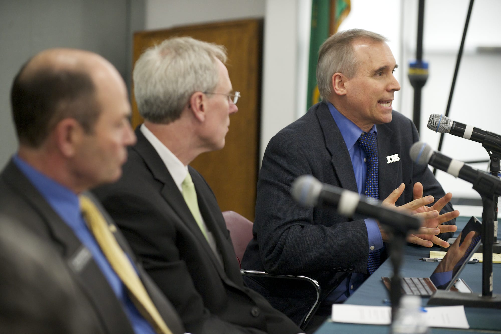 Clark County's Auditor Greg Kimsey, from left, Finance Director Mark Gassaway and Commissioner David Madore took part in the forum in April. Clark County commissioners missed Wednesday's deadline to respond to a scathing audit of a year-and-a-half-old county program that eliminates traffic impact and permit fees on nonresidential development.