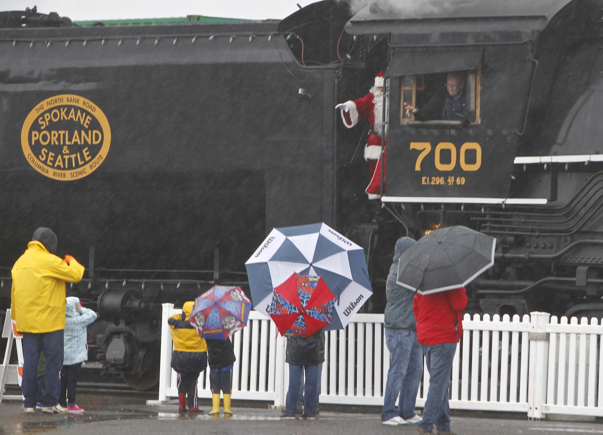 Kids and adults flock to Amtrak in Vancouver to catch a glimpse of Santa himself.