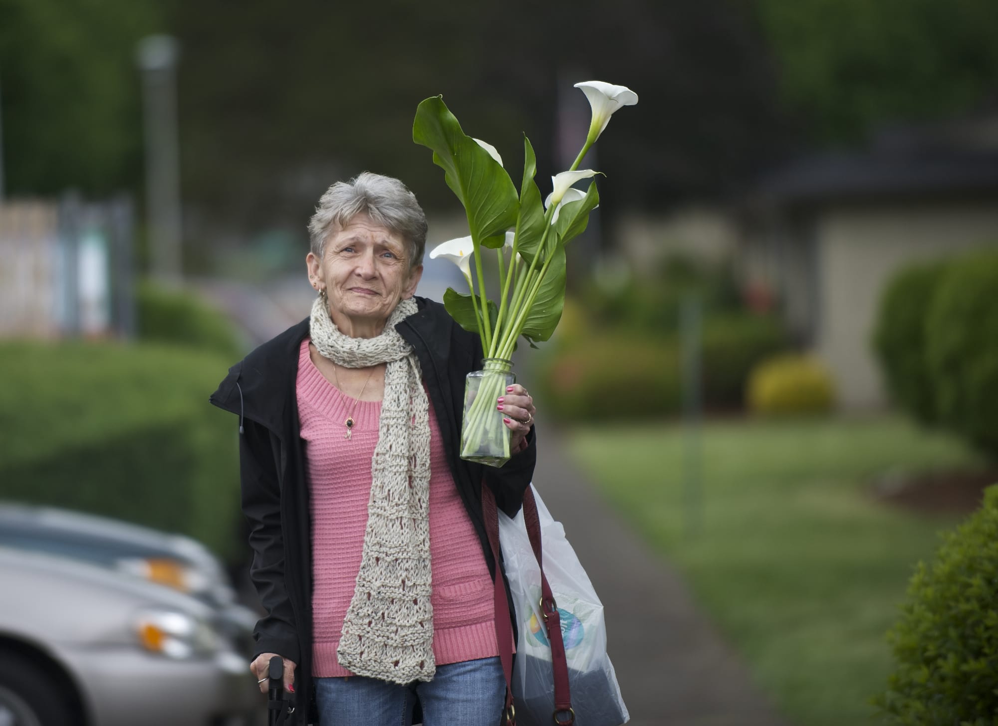 Mary Widerburg has lived in the Brandts apartments for 17 years, transferring her flower garden each time she's moved within the complex.