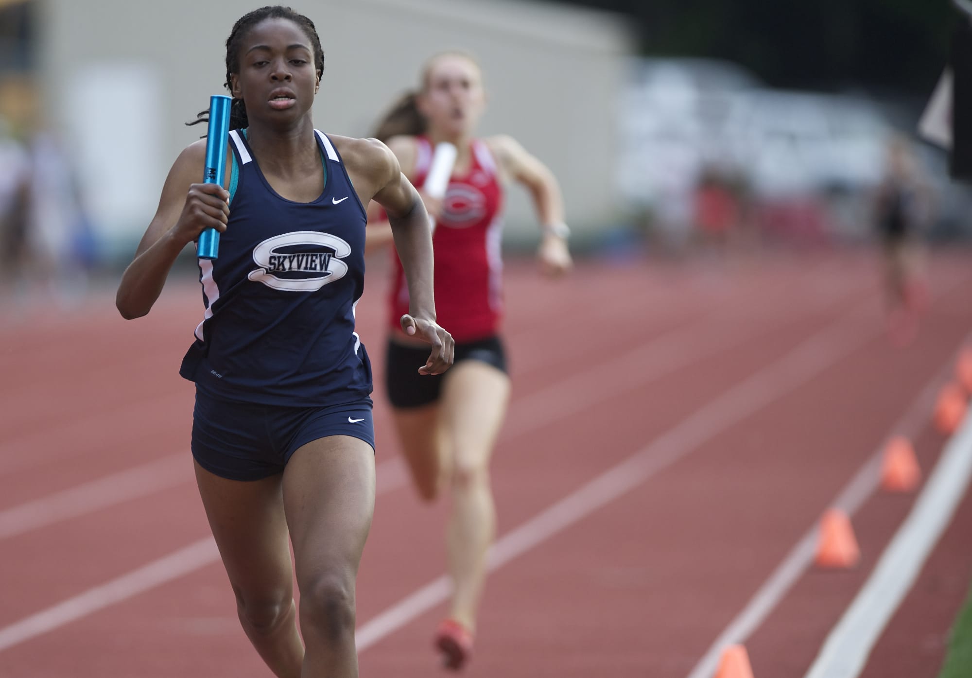 Skyview's Chisom Eke got the rare privilege of finishing ahead of Camas' Alexa Efraimson as Skyview won the girls 1,600 relay and district team title at McKenzie Stadium.