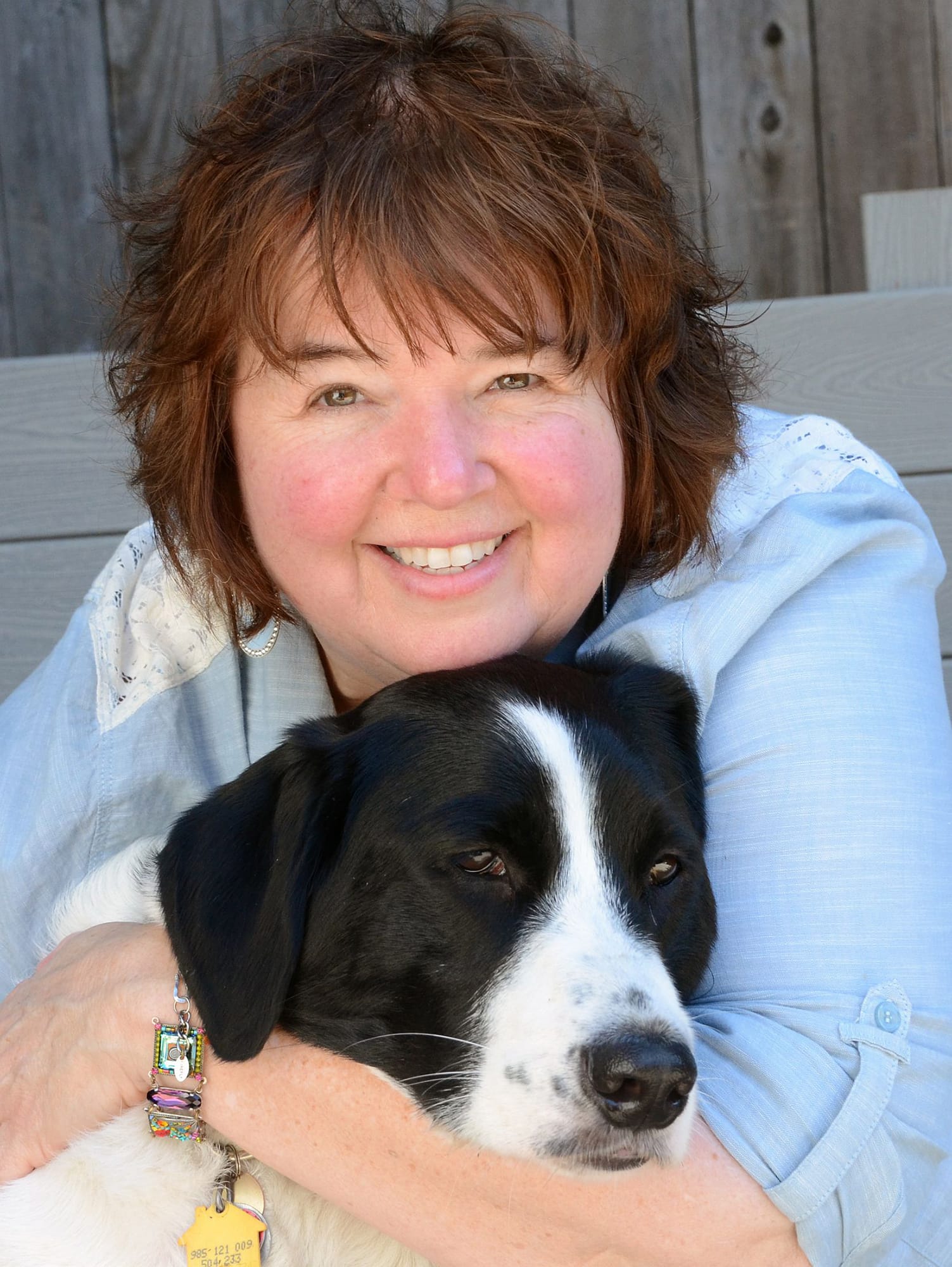 Vancouver watercolorist Bev Jozwiak and one of her favorite subjects, 75-pound border collie Chumlee.
