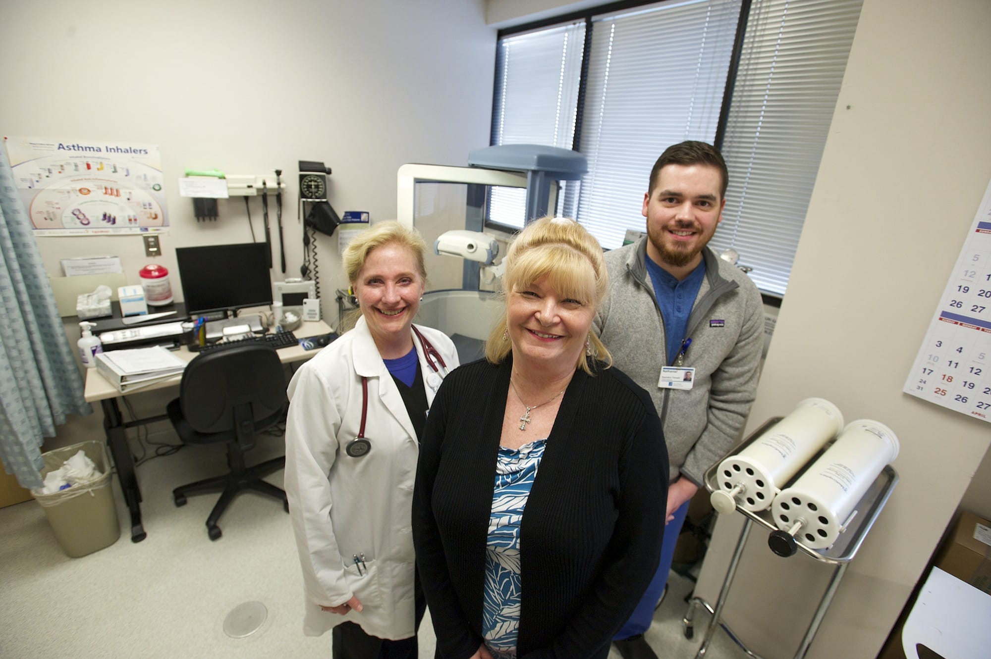 Tiffany Aplet, center, has been working to manage her chronic obstructive pulmonary disease with the assistance of a new COPD clinic at PeaceHealth Medical Group Pulmonary.