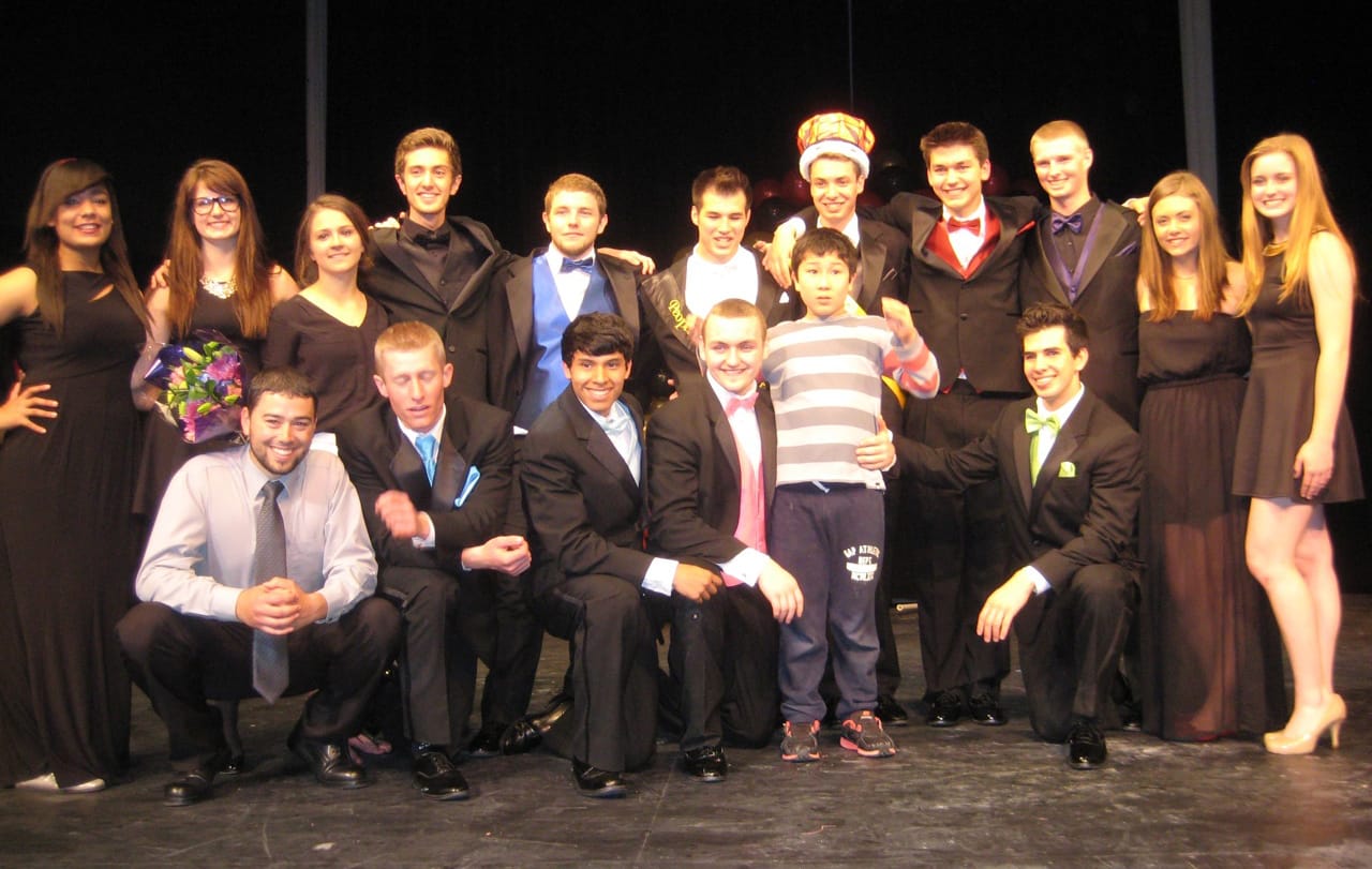 Battle Ground: Contestants and crew members of the Mr. Battle Ground Pageant stand on April 24 with 11-year-old John Hopper, for whom the students raised money for during the annual event. Top row, from left: Kyle Harris, Amanda Adler, Taylor Beardall, Hollis Cherry, Sheldon Michalios, Justin Smalley, Kaleb Armstrong, Taylor Smith, Ben Nikolas, Cassie Arrowsmith, Hana Wyles.