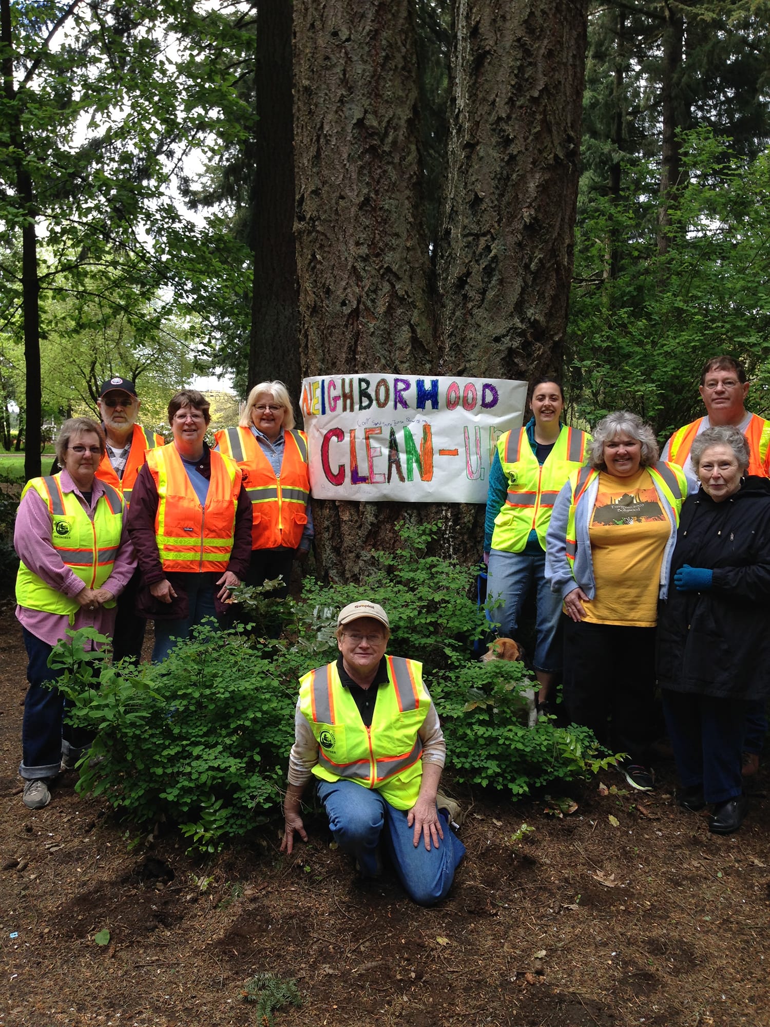 Maple Tree: Members of the Maple Tree Neighborhood Association celebrate cleaning up trash along Covington Road with a potluck April 26 at Orchards Park.