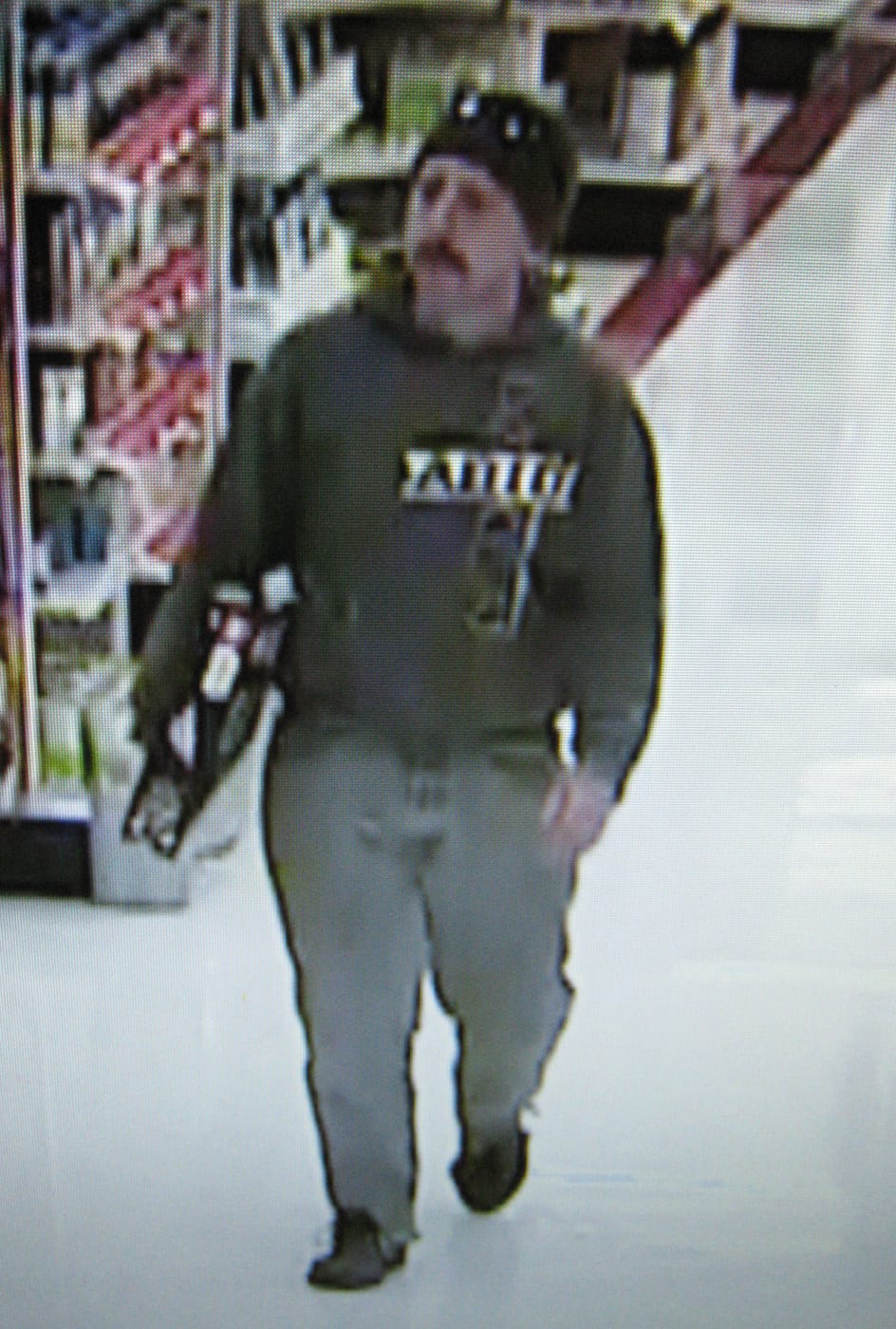 Police are looking for this man, who allegedly stole a woman's wallet while she was shopping at WinCo Foods in Brush Prairie and used her credit card to make fraudulent purchases.