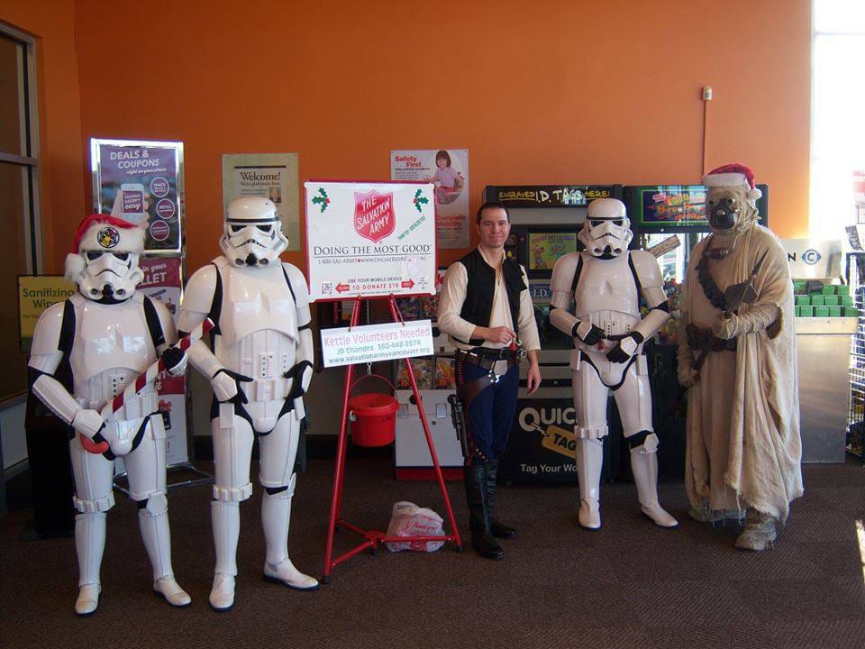 Orchards: Members of the &quot;Star Wars&quot;-themed Cloud City Garrison costume club, a chapter of the 501st Legion of Stormtroopers organization, rings bells for The Salvation Army Red Kettle fundraiser on Dec.