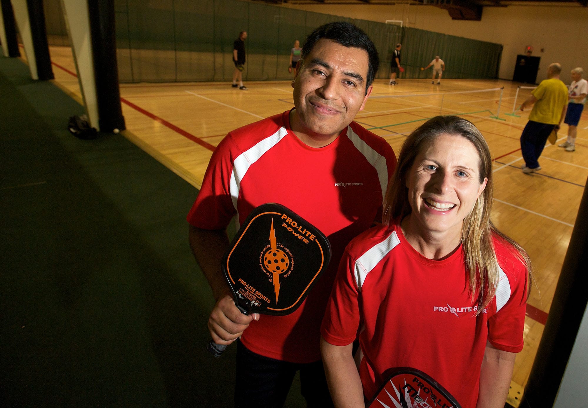 Enrique Ruiz of Washougal and Christine Barksdale of Vancouver are nationally ranked pickleball champions.