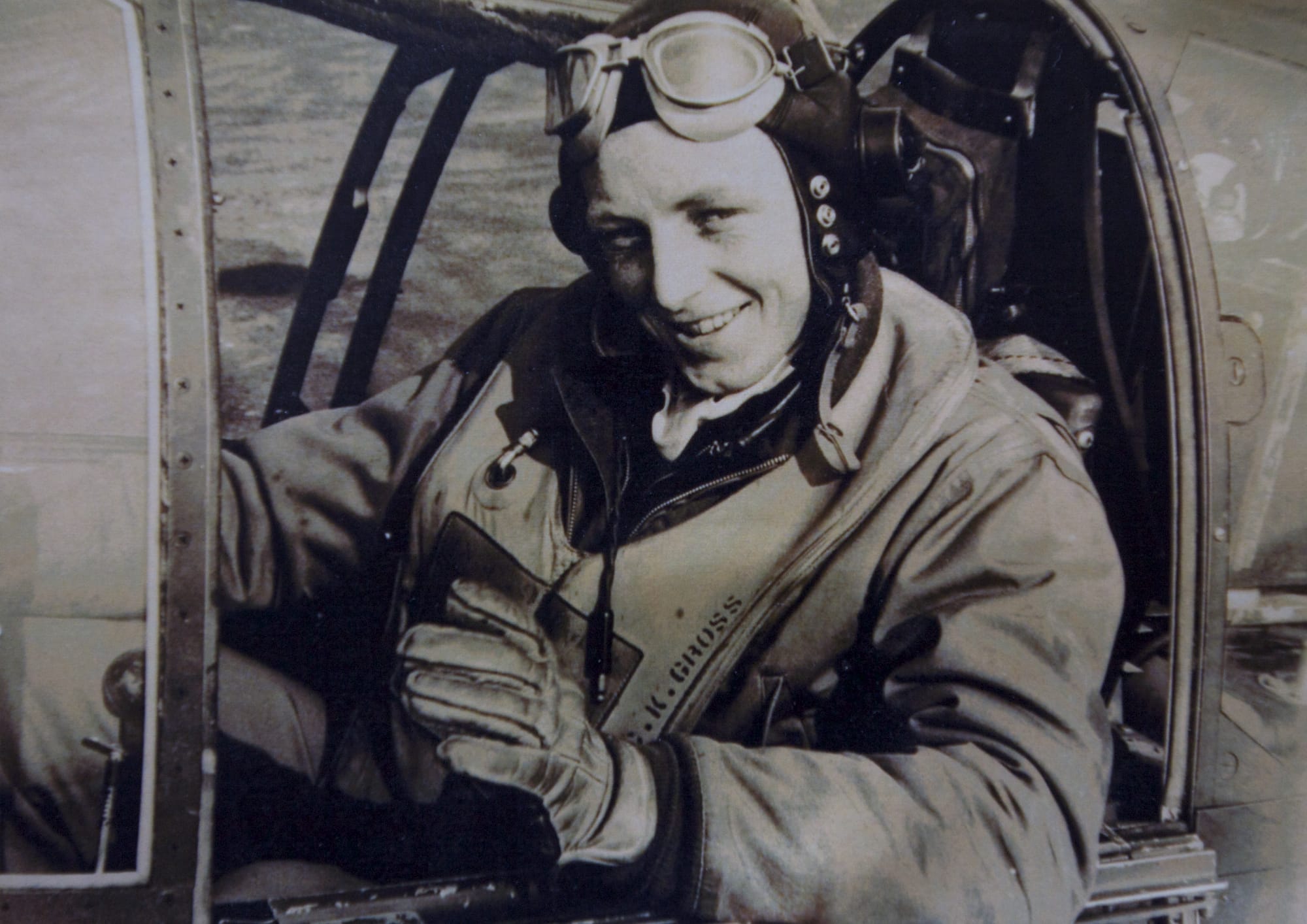 A photo from World War II shows ace fighter pilot Clayton Kelly Gross in his P-51 Mustang, &quot;Live Bait.&quot;