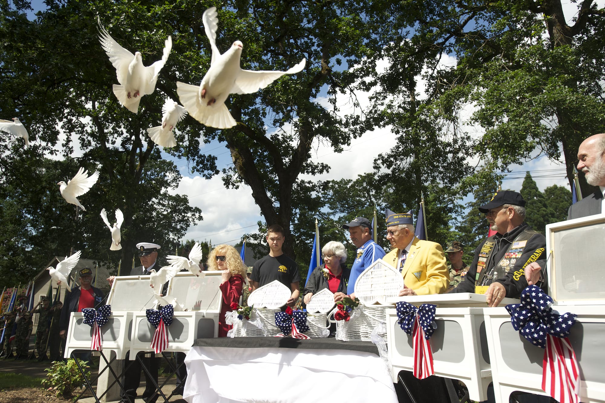 White doves are released Monday in memory of those who died in the line of duty, including Air Force Capt. Chris Stover, during an observance at the Clark County Veterans War Memorial. Stover died Jan. 7 when his helicopter crashed in England during training.