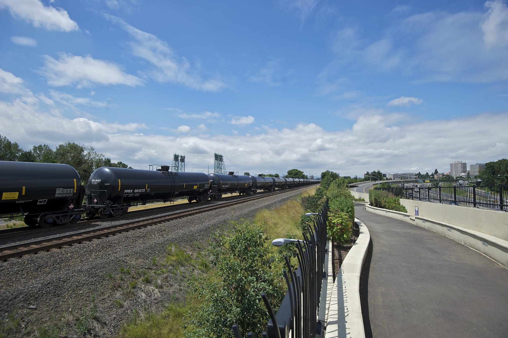 An oil train passes the Vancouver Land Bridge on Tuesday.