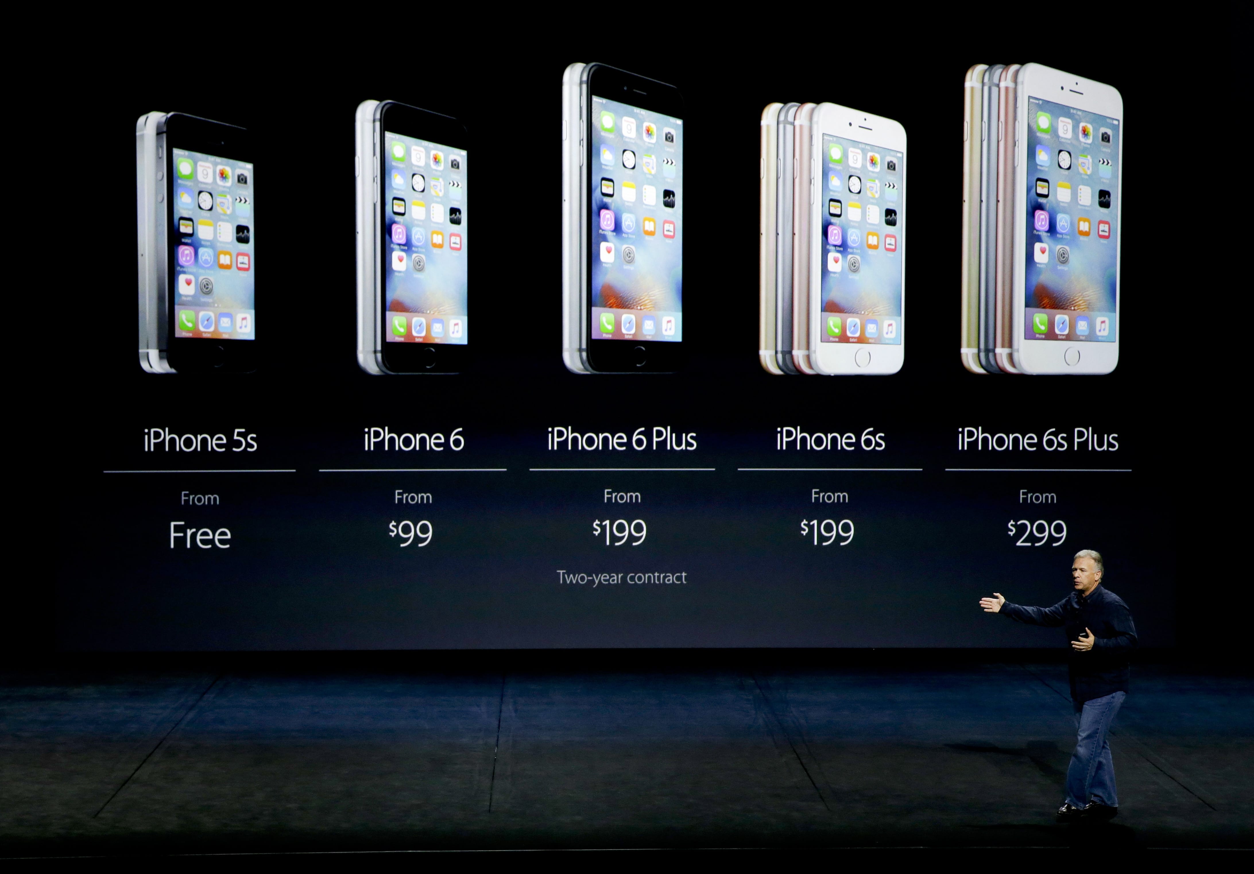 Phil Schiller, Apple's senior vice president of worldwide marketing, talks about the pricing of the new iPhone 6s and iPhone 6s Plus during the Apple event at the Bill Graham Civic Auditorium in San Francisco on Wednesday.