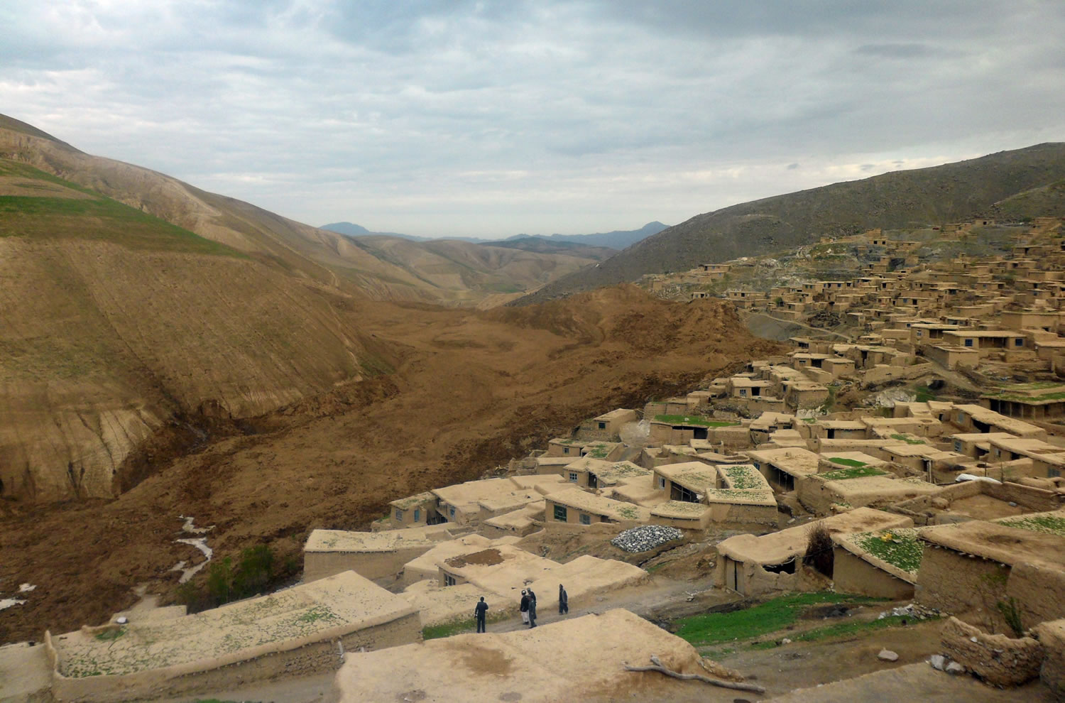 A  torrent of mud and earth buried part of the remote village of Abi-Barik, Afghanistan, on Friday.