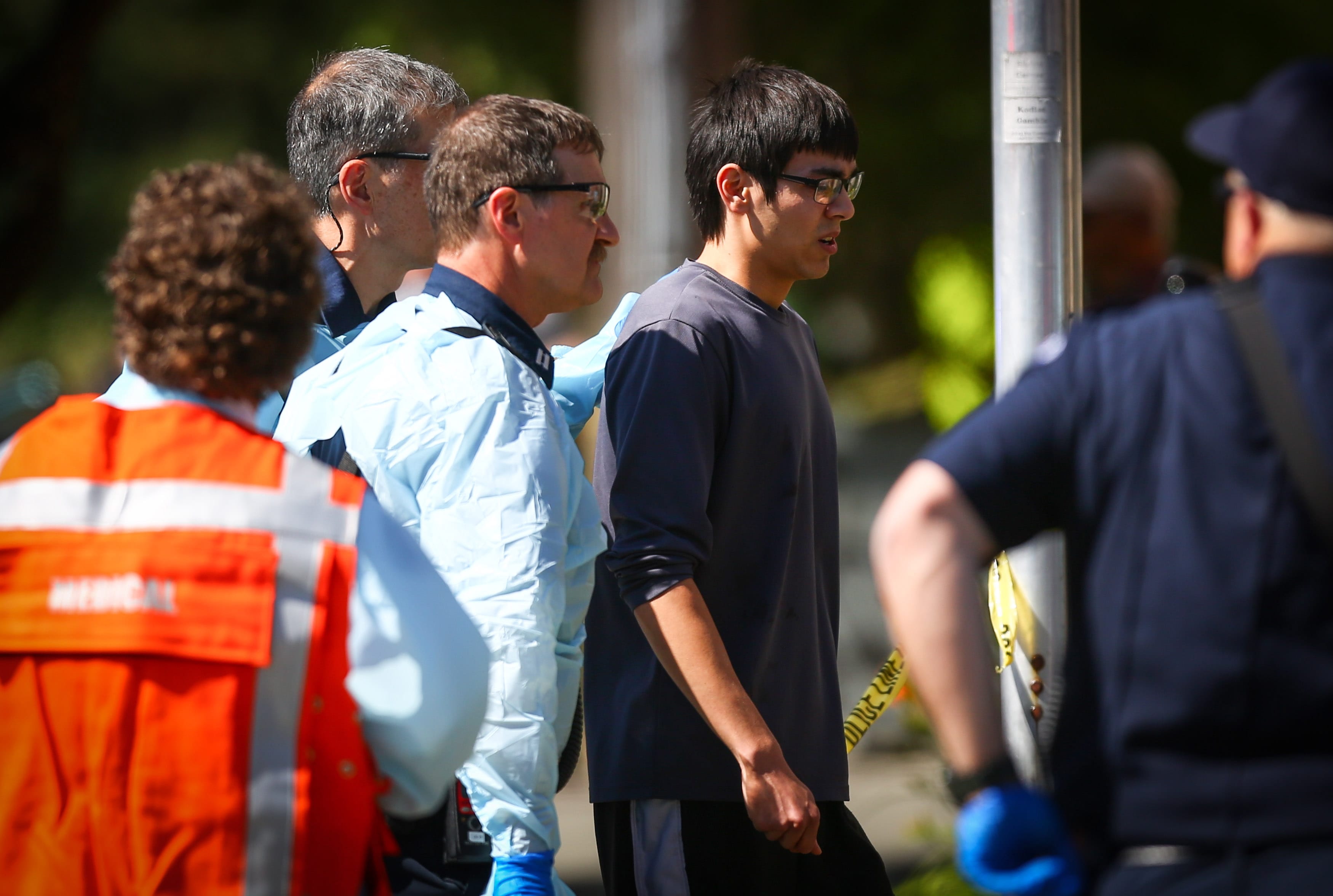 Jon Meis is taken from the scene by medics after a shooting at Seattle Pacific University on Thursday in Seattle.
