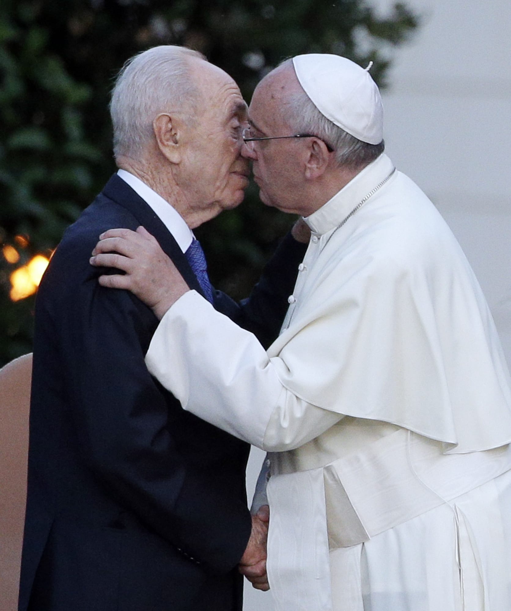 Associated Press
Pope Francis and Israel's President Shimon Peres, left, greet during an evening of peace prayers with Palestinian President Mahmoud Abbas in the Vatican gardens Sunday.