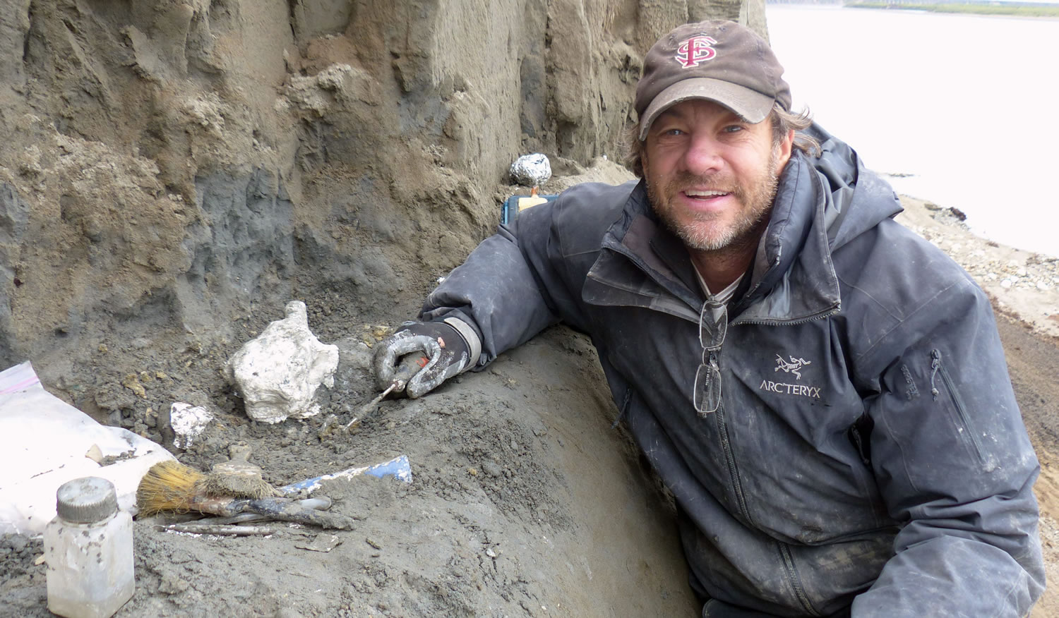 Researcher Greg Erickson works in a spot of the Liscomb Bed dig site near Nuiqsut, Alaska.