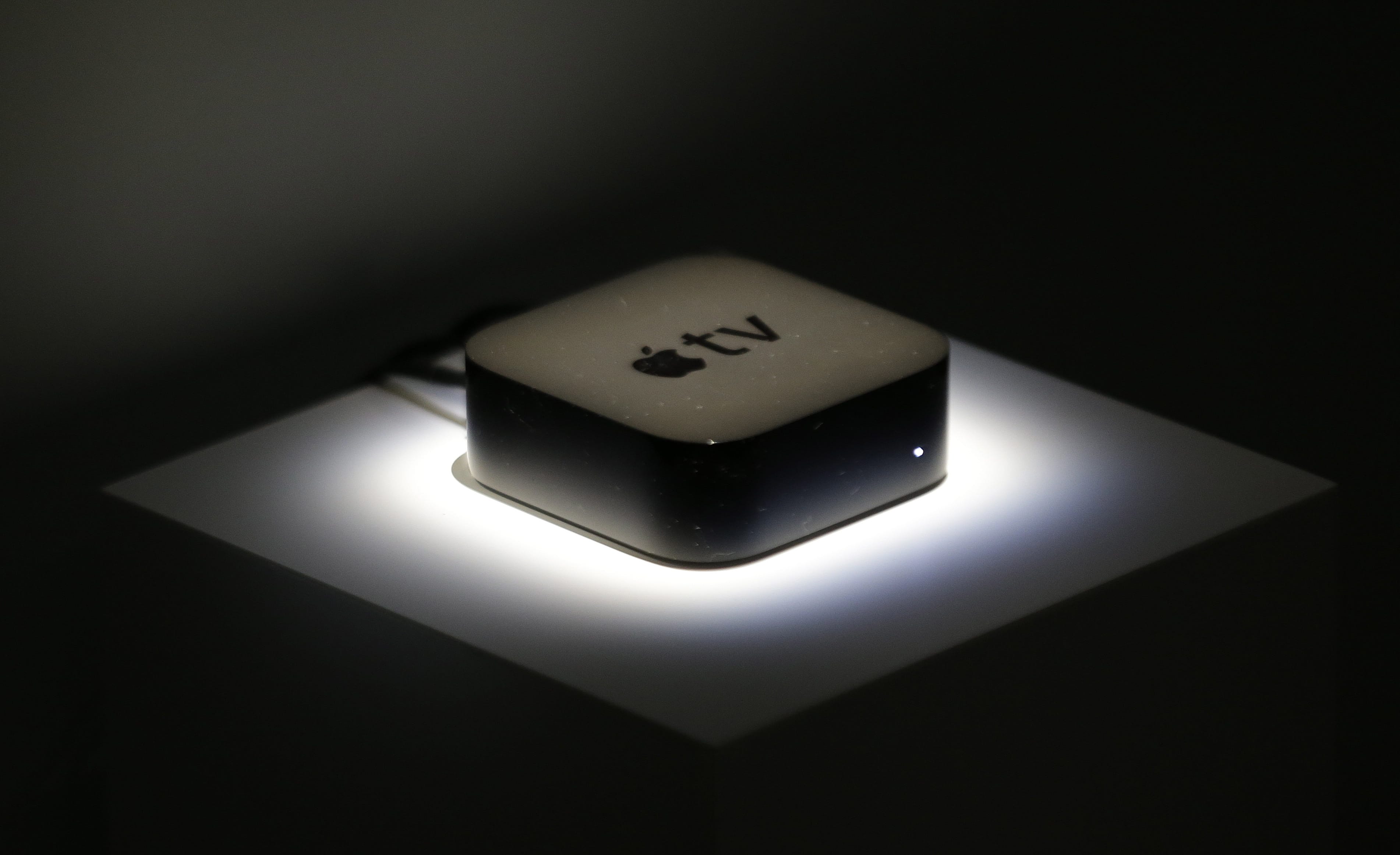 The new Apple TV box is shown during a product display following an Apple event Wednesday in San Francisco. Apple staked a new claim to the living room on Wednesday, as the maker of iPhones and other hand-held gadgets unveiled an Internet TV system that's designed as a beachhead for the tech giant's broader ambitions to deliver a wide range of information, games, music and video to the home.