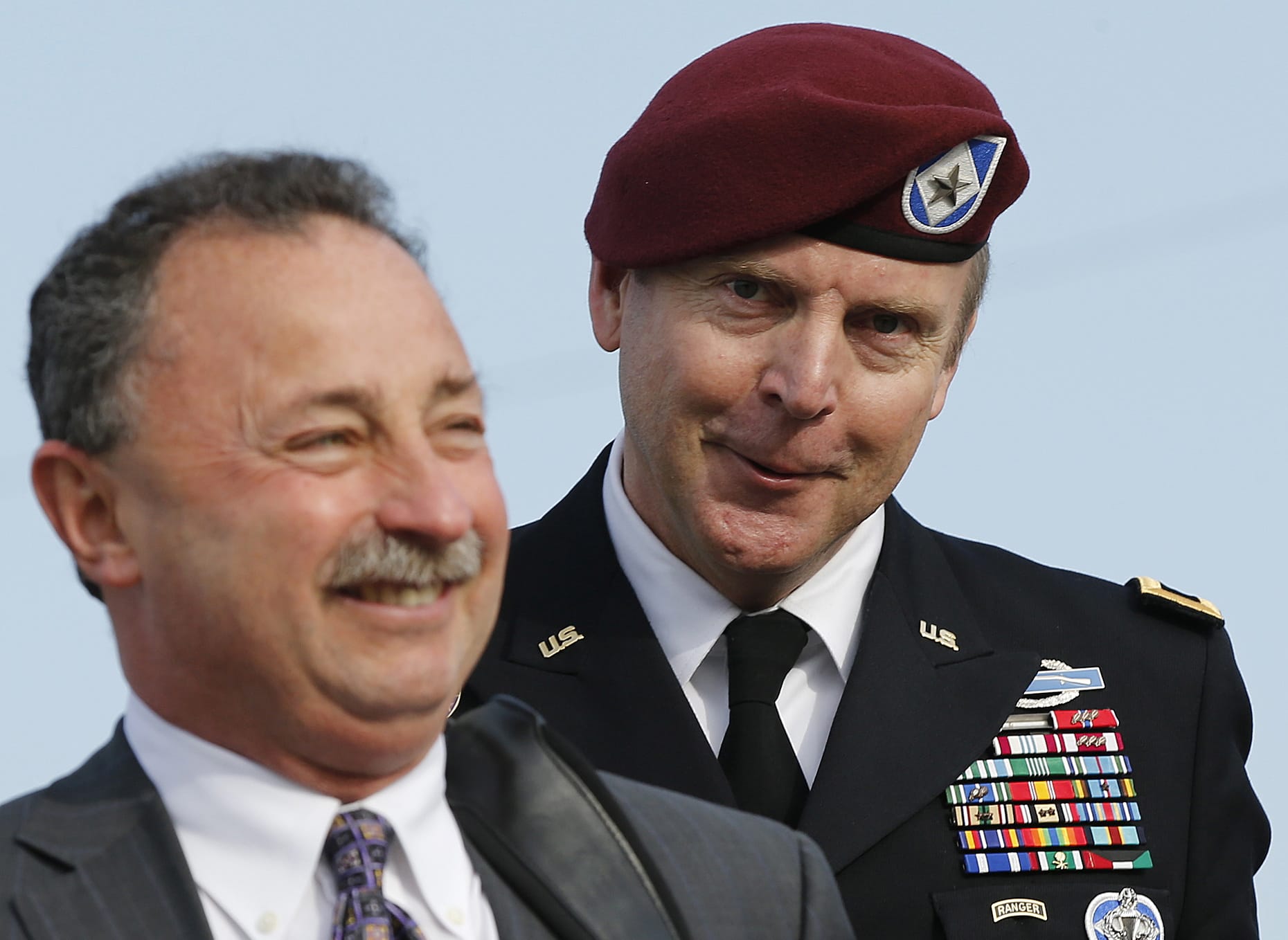 Brig. Gen. Jeffrey Sinclair, right, who admitted to inappropriate relationships with three subordinates, arrives at the courthouse with attorney Richard Scheff for sentencing Fort Bragg, N.C., Thursday, March 20, 2014.