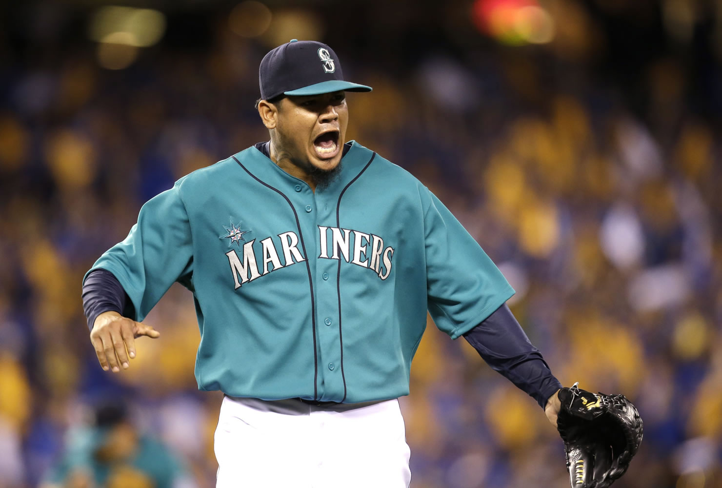 Seattle Mariners starting pitcher Felix Hernandez yells after the final out of the eighth inning against the Houston Astros on Friday. Hernandez left at the end of that inning, after fielding a grounder from Dexter Fowler to start a double play.