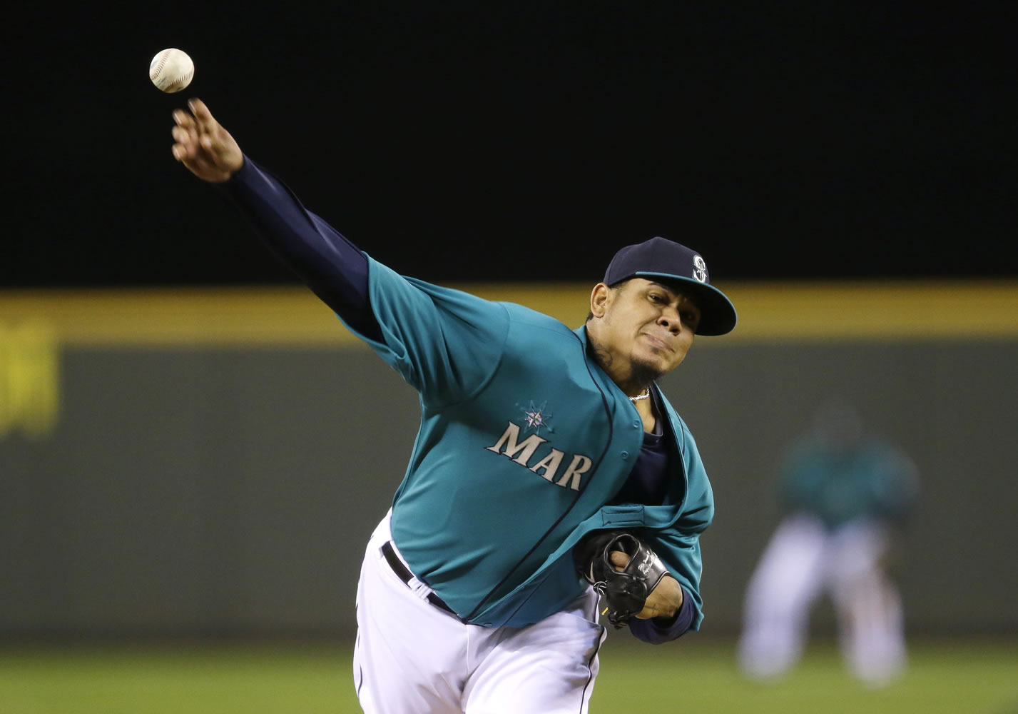 Seattle Mariners starting pitcher Felix Hernandez throws against the Oakland Athletics in the sixth inning Friday.