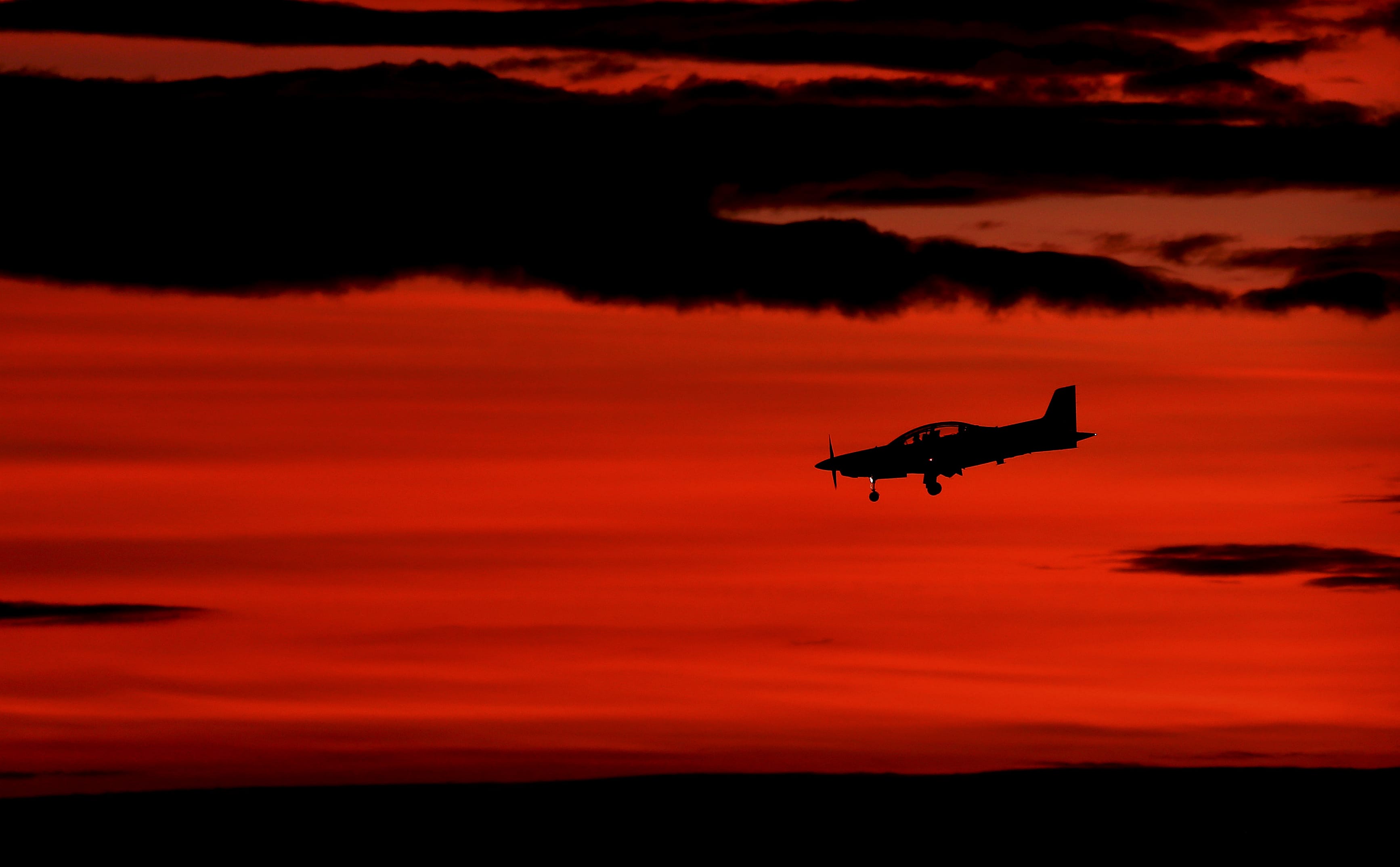 A Pilatus PC-9/A comes in for a landing at RAAF Base Pearce in Perth, Australia, on Wednesday.