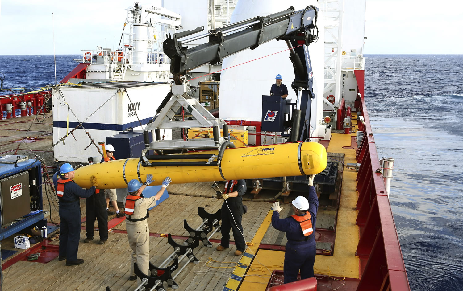 The autonomous underwater vehicle deploys from ADV Ocean Shield in the search of the missing Malaysia Airlines Flight 370 in the southern Indian Ocean on Monday.