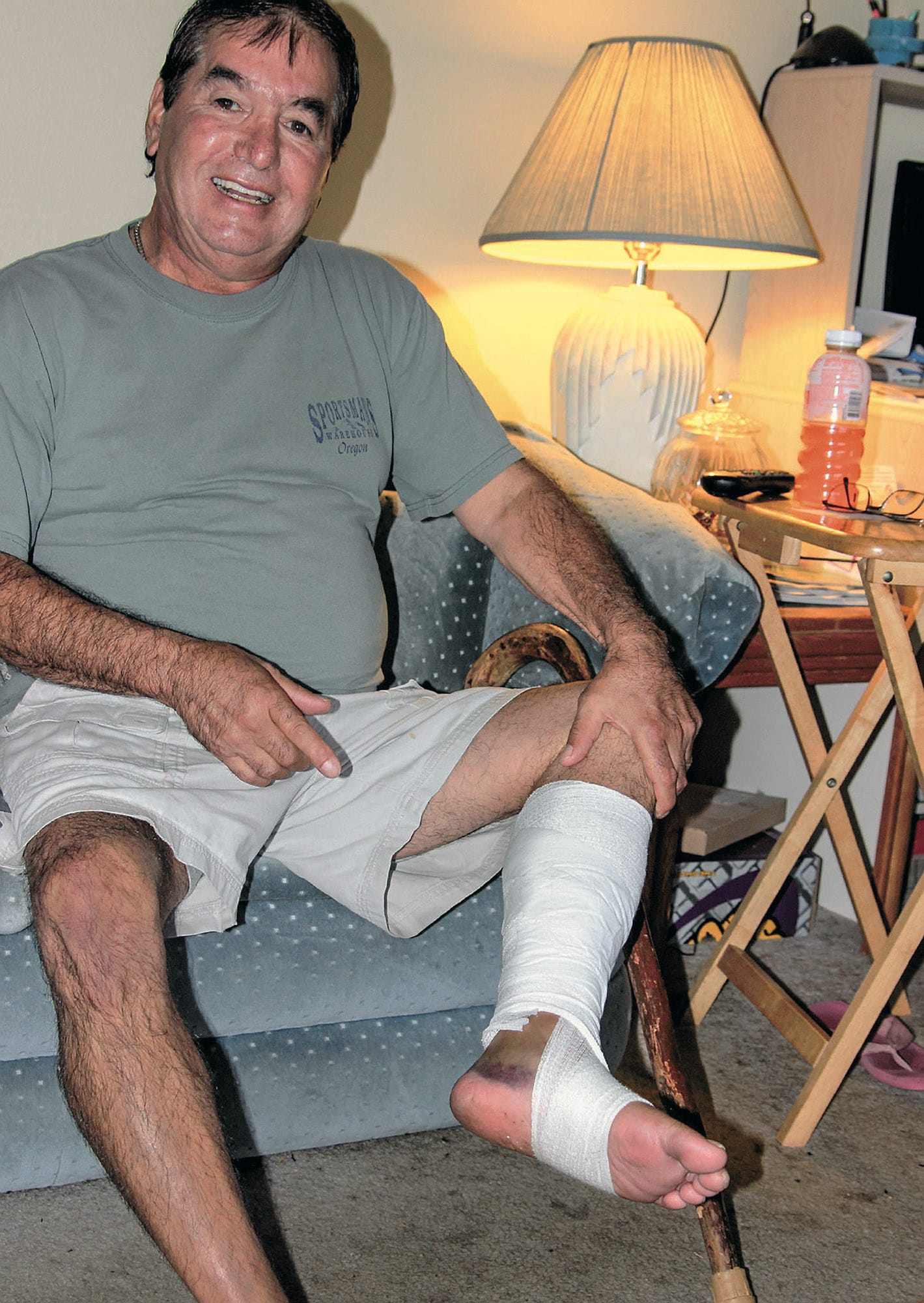 Jerry Hause, 60, shows his bandaged leg Thursday after he suffered a bear attack while bow hunting Monday about 8 miles west of Longview. He said he'd never seen a bear in that area. Washington Fish and Wildlife Sgt.