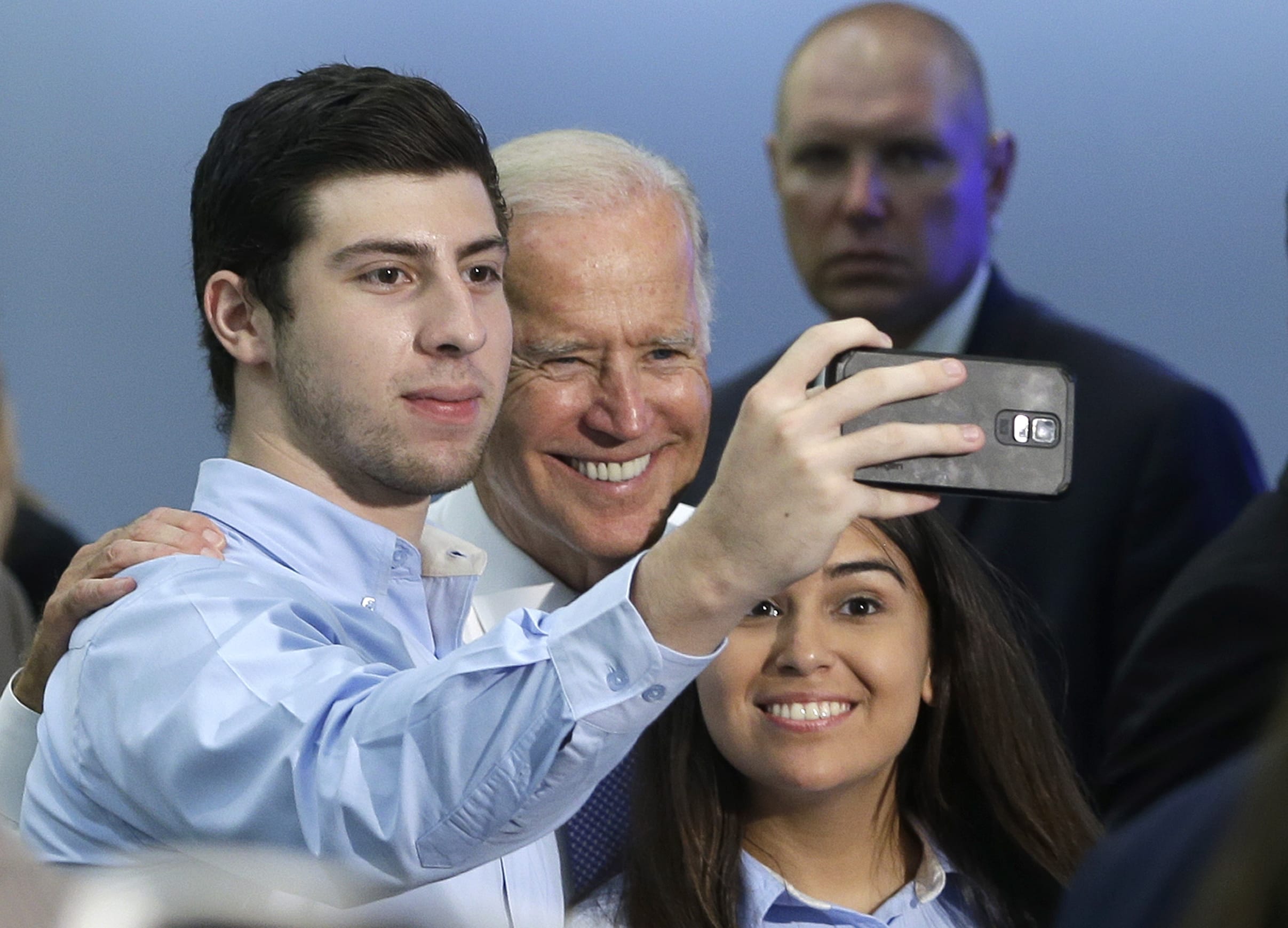 Vice President Joe Biden poses for a selfie with supporters Wednesday, Sept. 2, 2015, at Miami Dade College in Miami. Vice President Biden traveled to Florida to support Senate Democrats and the administration's education agenda.