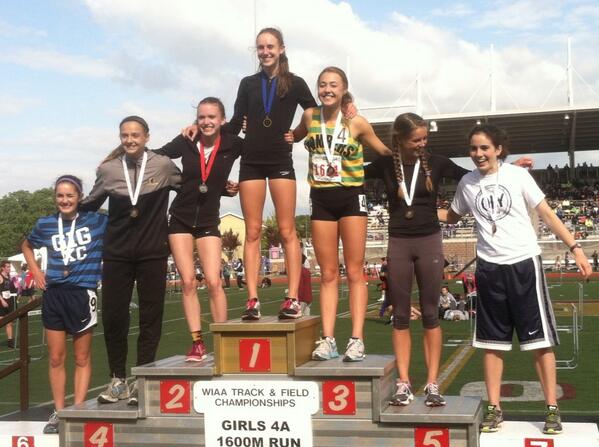 Camas' Alexa Efraimson stands atop the podium as the 4A state champion in the girls 1,600 meters.