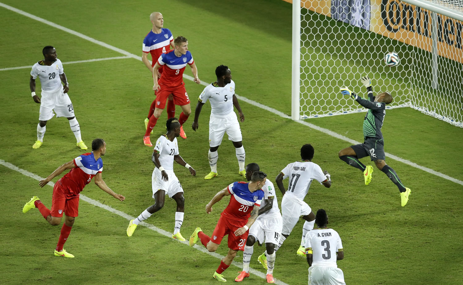 United States' John Brooks, second from left, scores his side's second goal during the group G World Cup soccer match between Ghana and the United States at the Arena das Dunas in Natal, Brazil, Monday.
