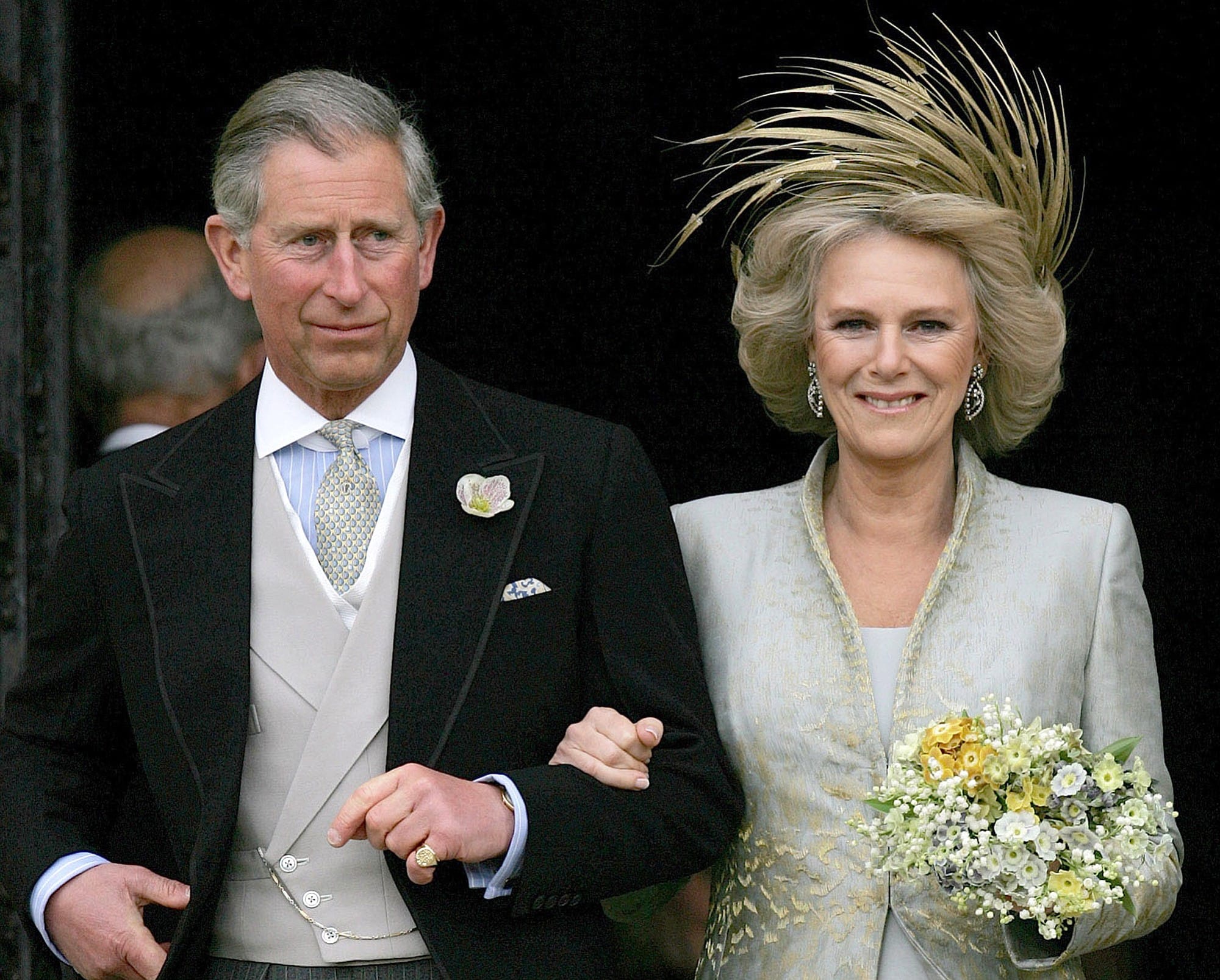 Britain's Prince Charles and his bride Camilla Duchess of Cornwall as they leave St George's Chaple in Windsor, England, following the church blessing of their civil wedding ceremony on April 9, 2005.