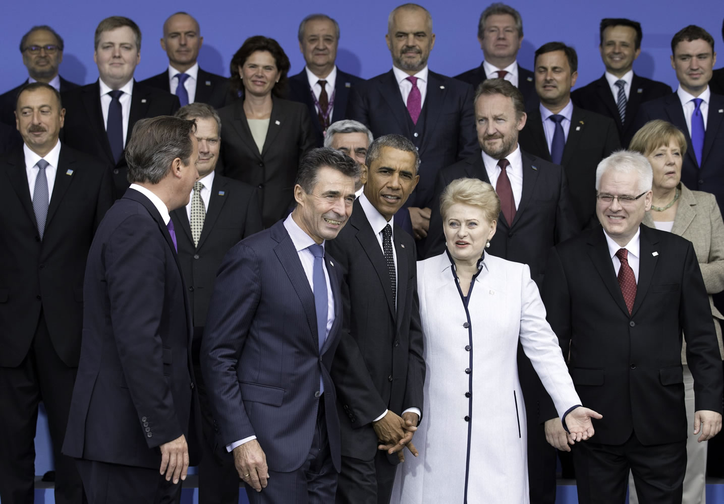 From front left, British Prime Minister David Cameron, NATO Secretary General Anders Fogh Rasmussen, U.S.