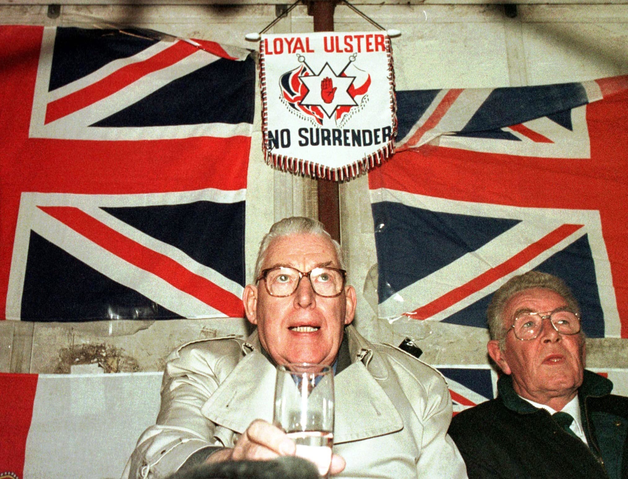 Northern Ireland's Democratic Unionist Party leader Ian Paisley prepares to address a crowd of around 1,000 loyalist supporters April 4, 1997, as they gathered for a &quot;right-to-march&quot; rally in Portadown, Northern Ireland. Paisley, the fiery Protestant leader, has died in Northern Ireland at age 88, his wife, Eileen, said Friday Sept.
