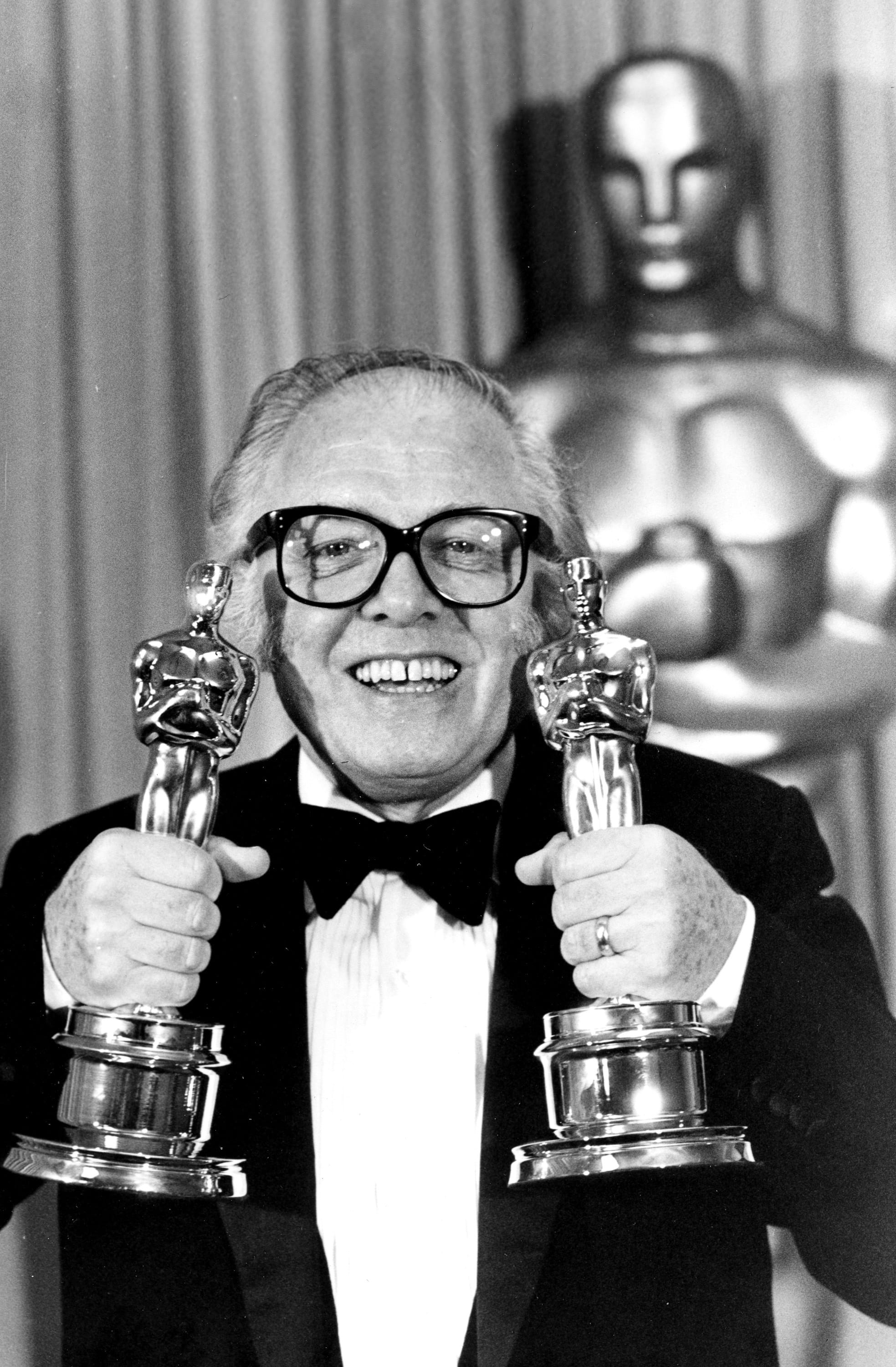 Associated Press files
British actor and director Richard Attenborough holds his two Oscars for his epic movie &quot;Gandhi&quot; in 1983 at the 55th annual Academy Awards in Los Angeles. Attenborough died Sunday.