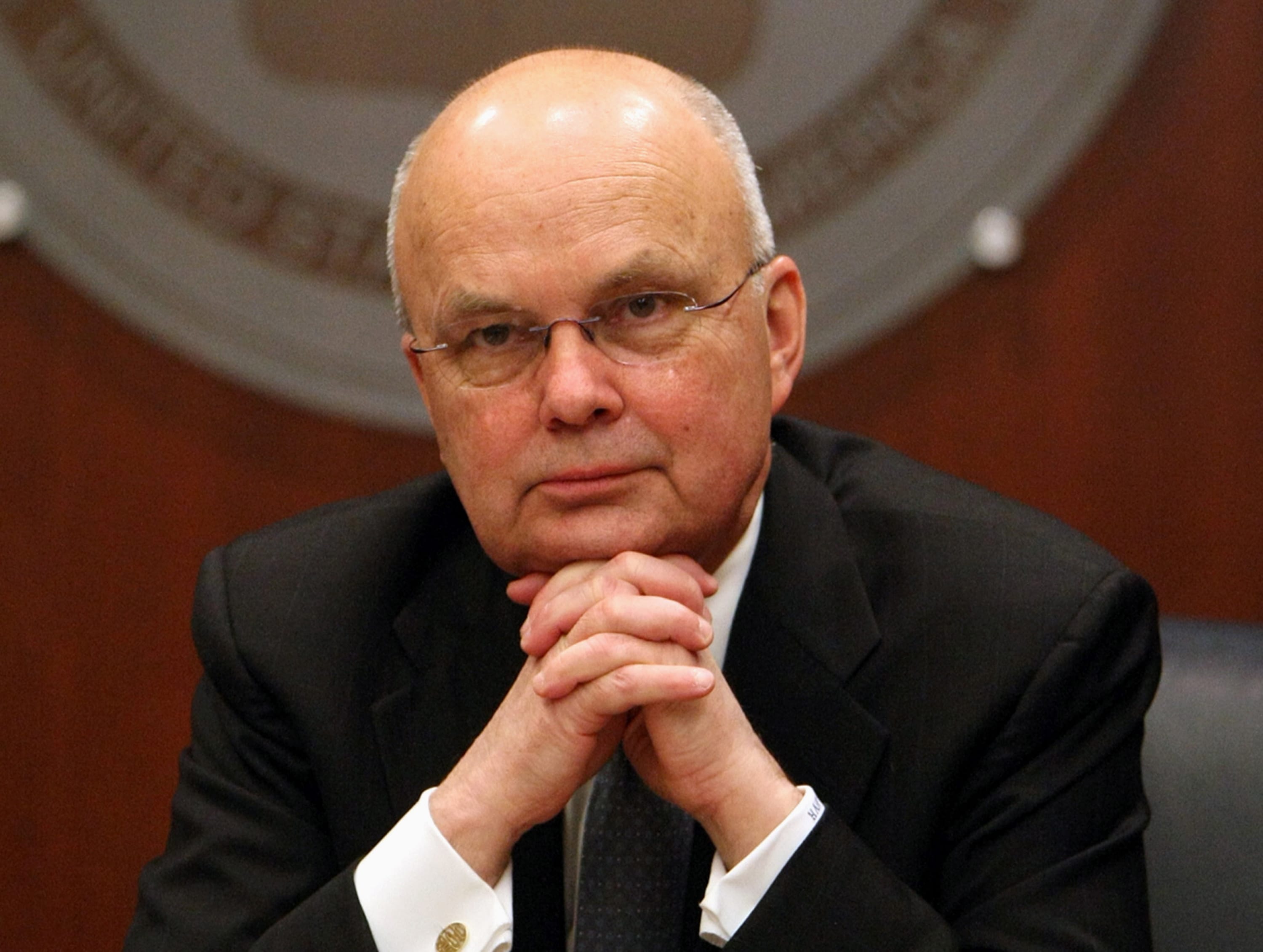 Then-CIA Director Michael Hayden, and a former National Security Agency chief, participates in a news conference at CIA headquarters in Langley, Va., on Jan.