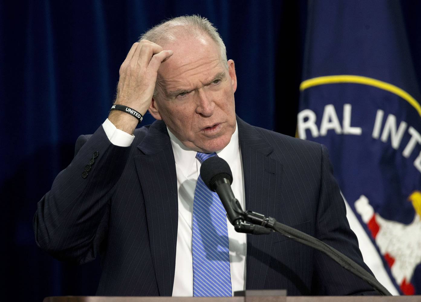 CIA Director John Brennan gestures during a news conference Thursday at CIA headquarters in Langley, Va.