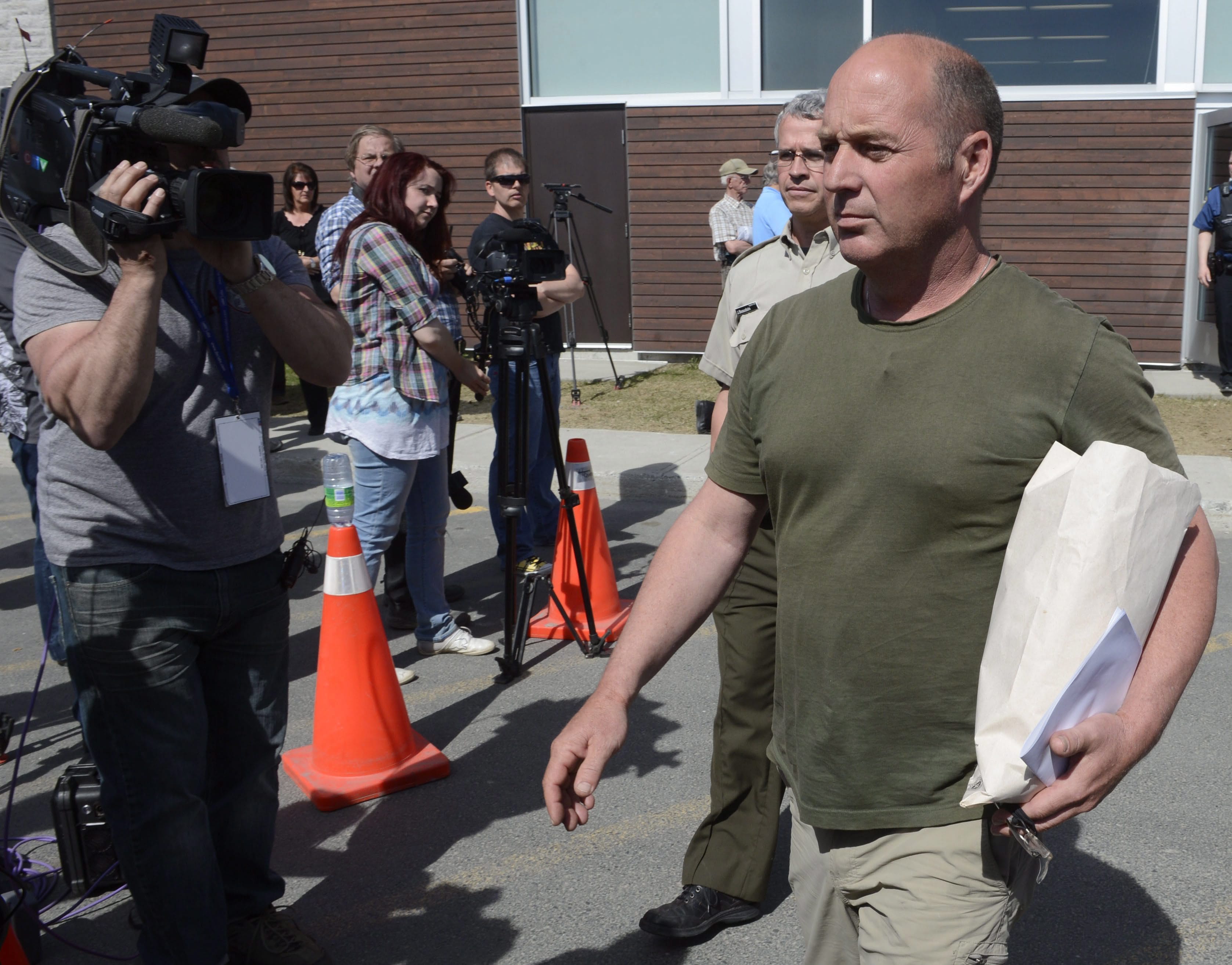 Former Montreal, Maine and Atlantic Railway Ltd. employee Thomas Harding leaves court today after being granted bail in Lac-Megantic, Quebec.